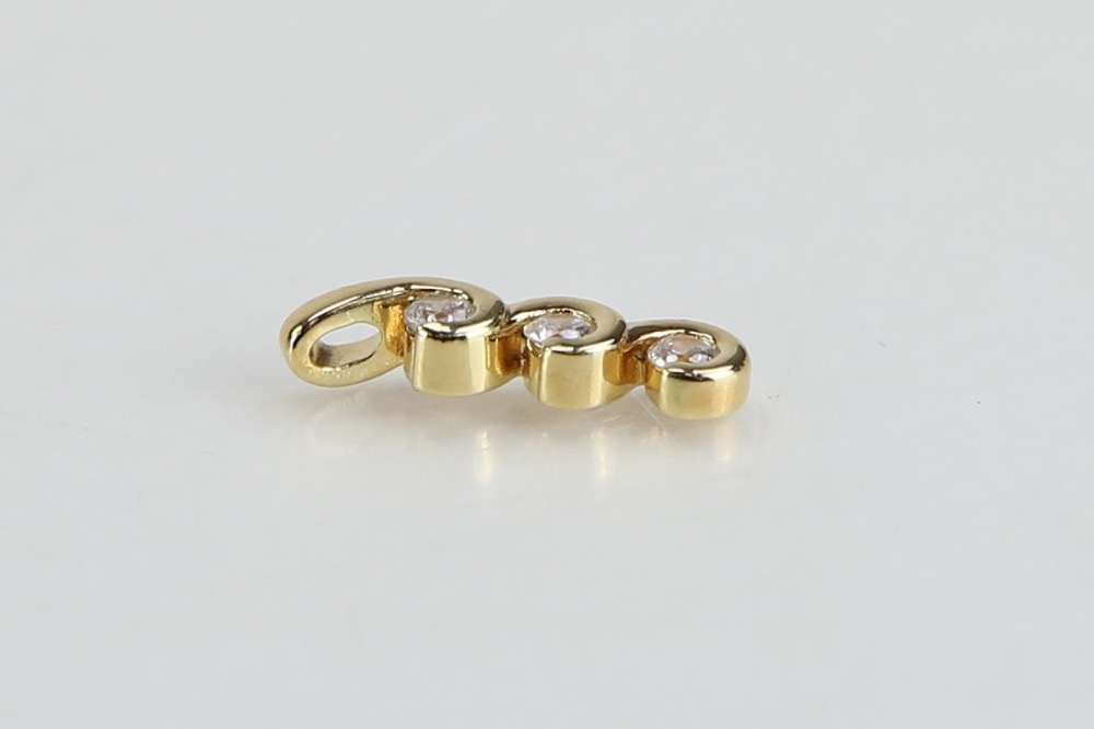 Gold Tone Rings and Pendant