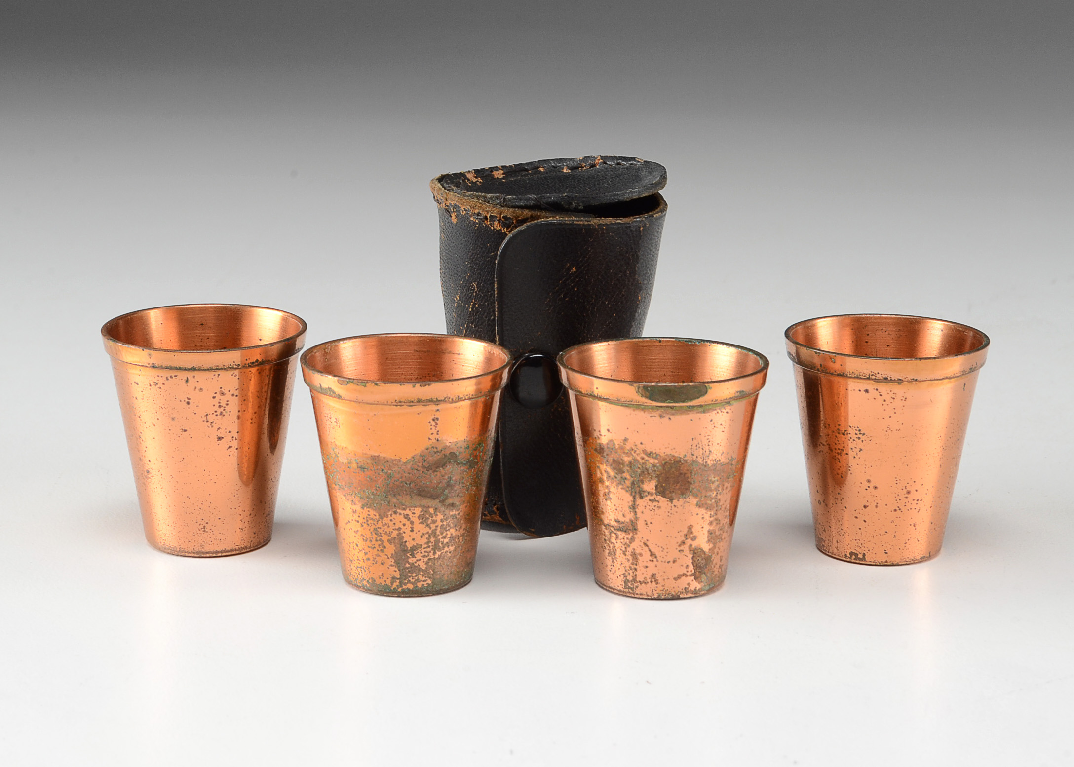 Set of Four Copper Shot Glasses  With Leather Case
