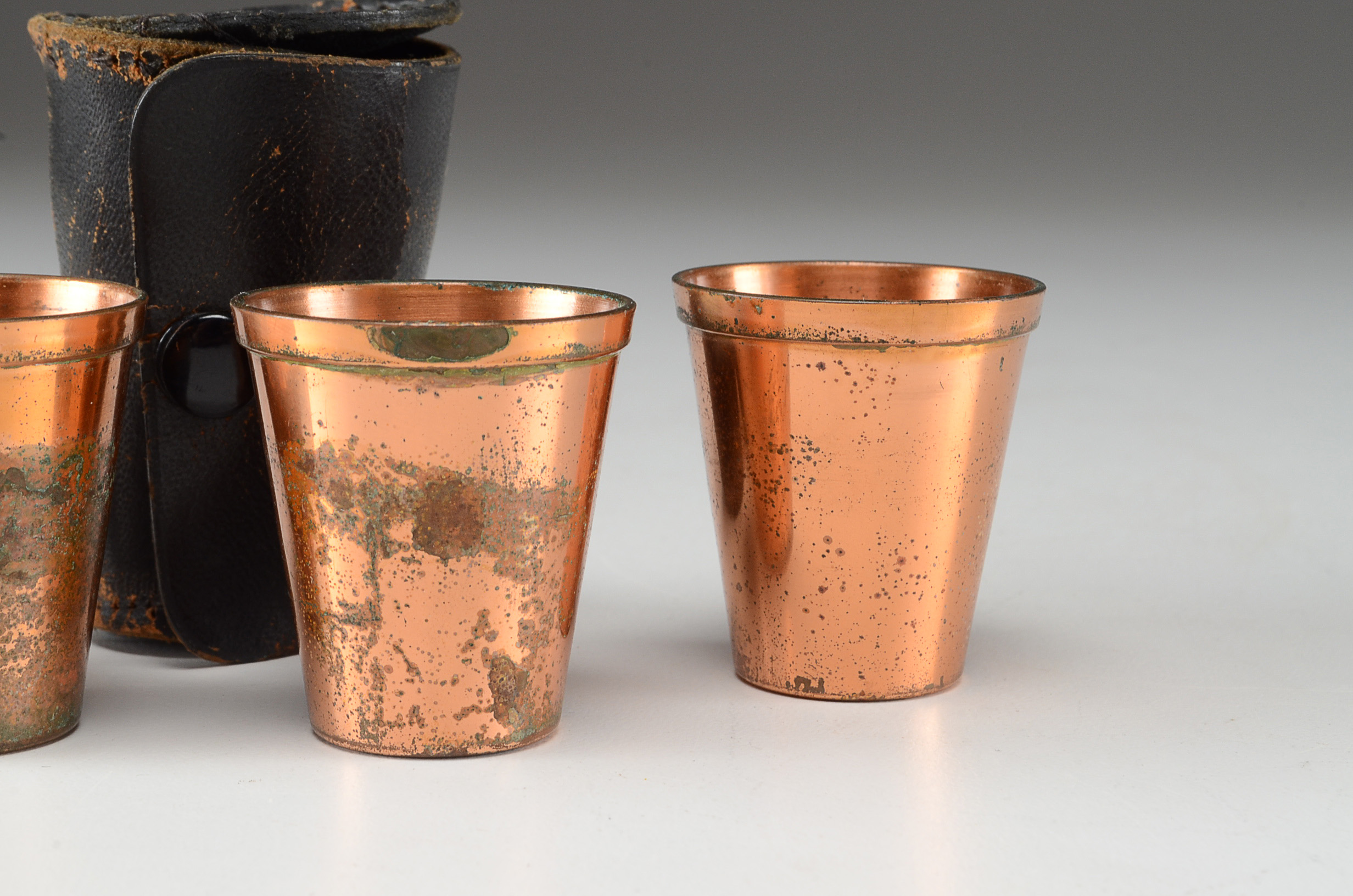 Set of Four Copper Shot Glasses  With Leather Case