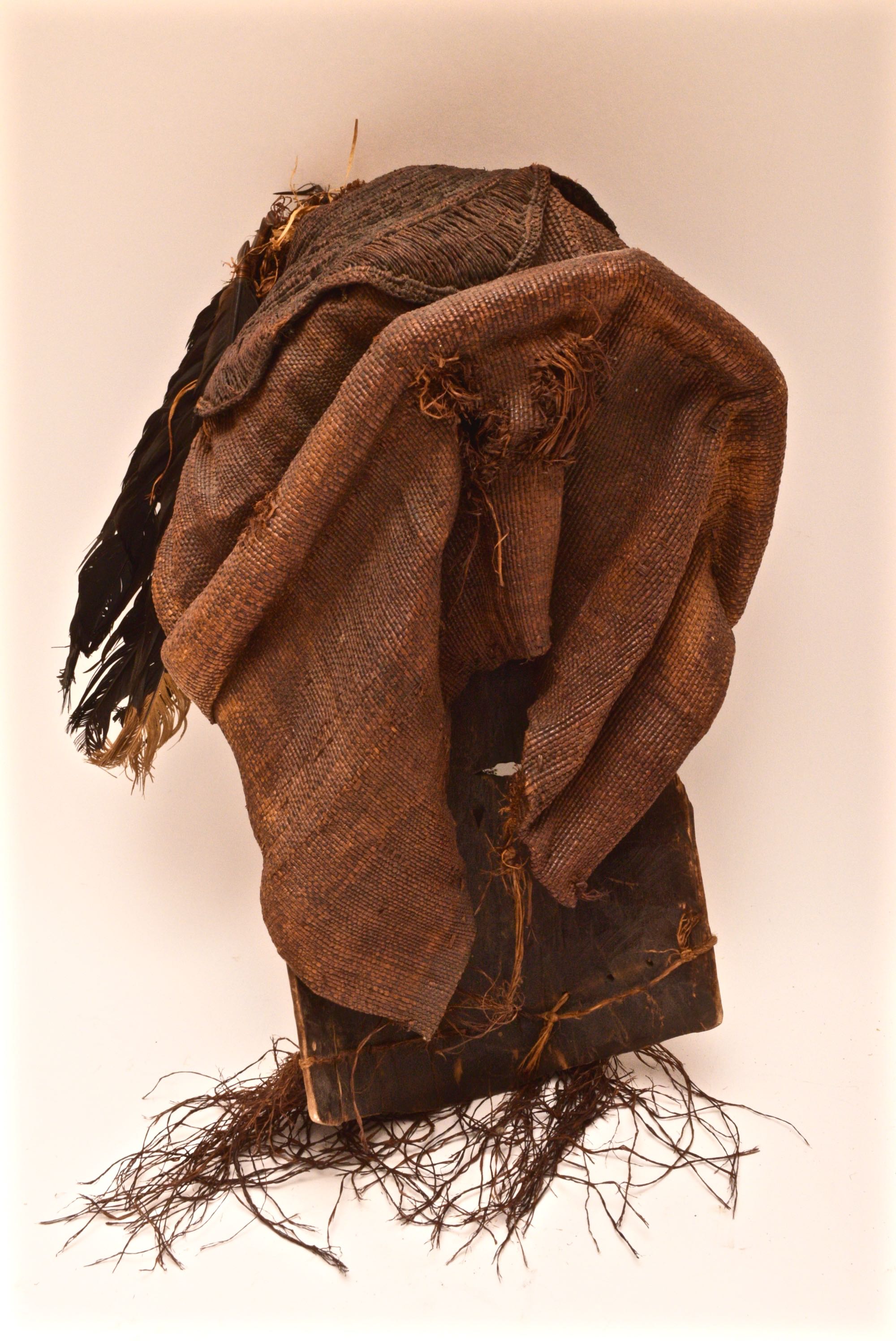 Handcrafted African Wooden Tribal Mask with Feathers