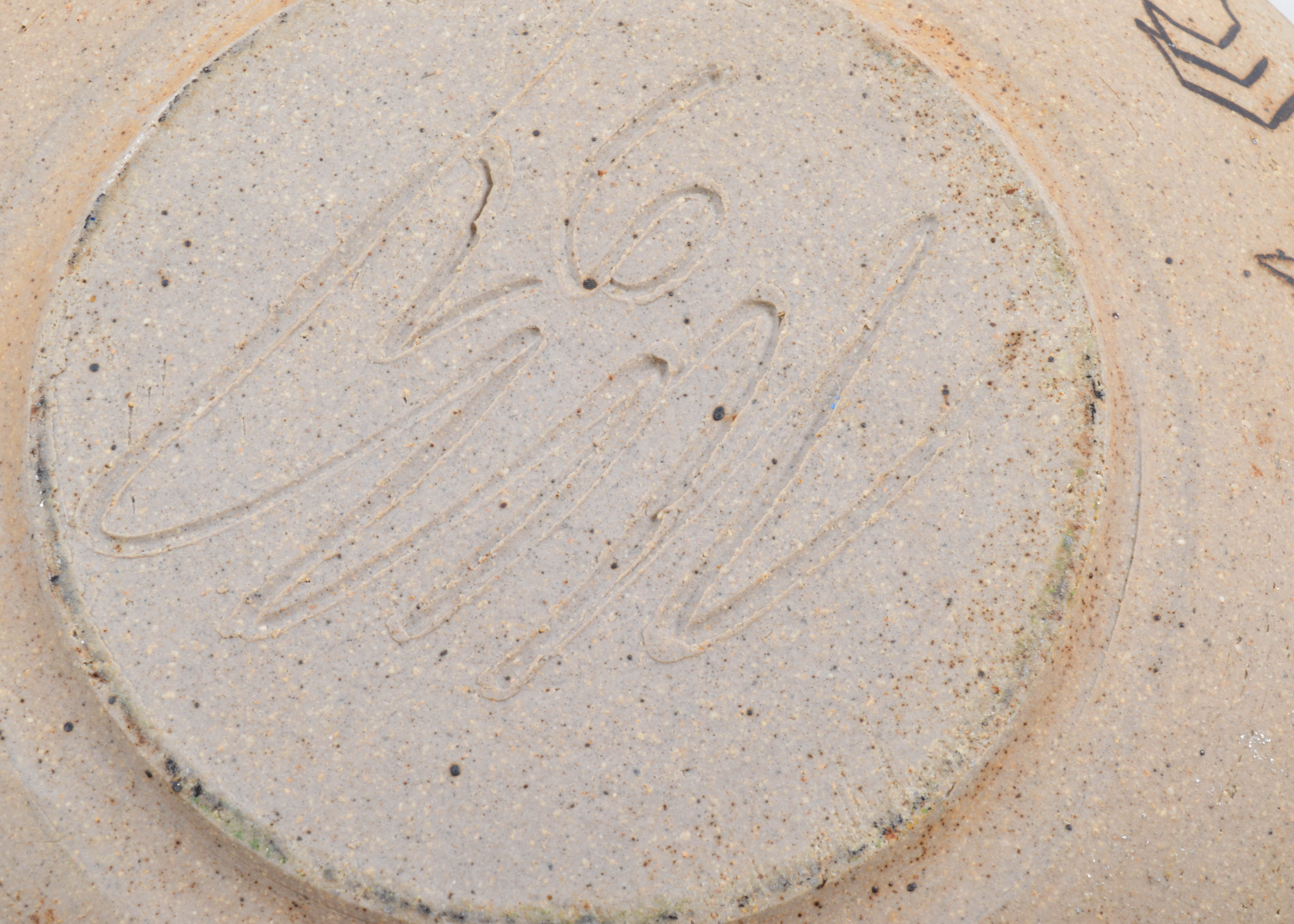 Signed Pueblo Stoneware Bowl with Rabbit Motif