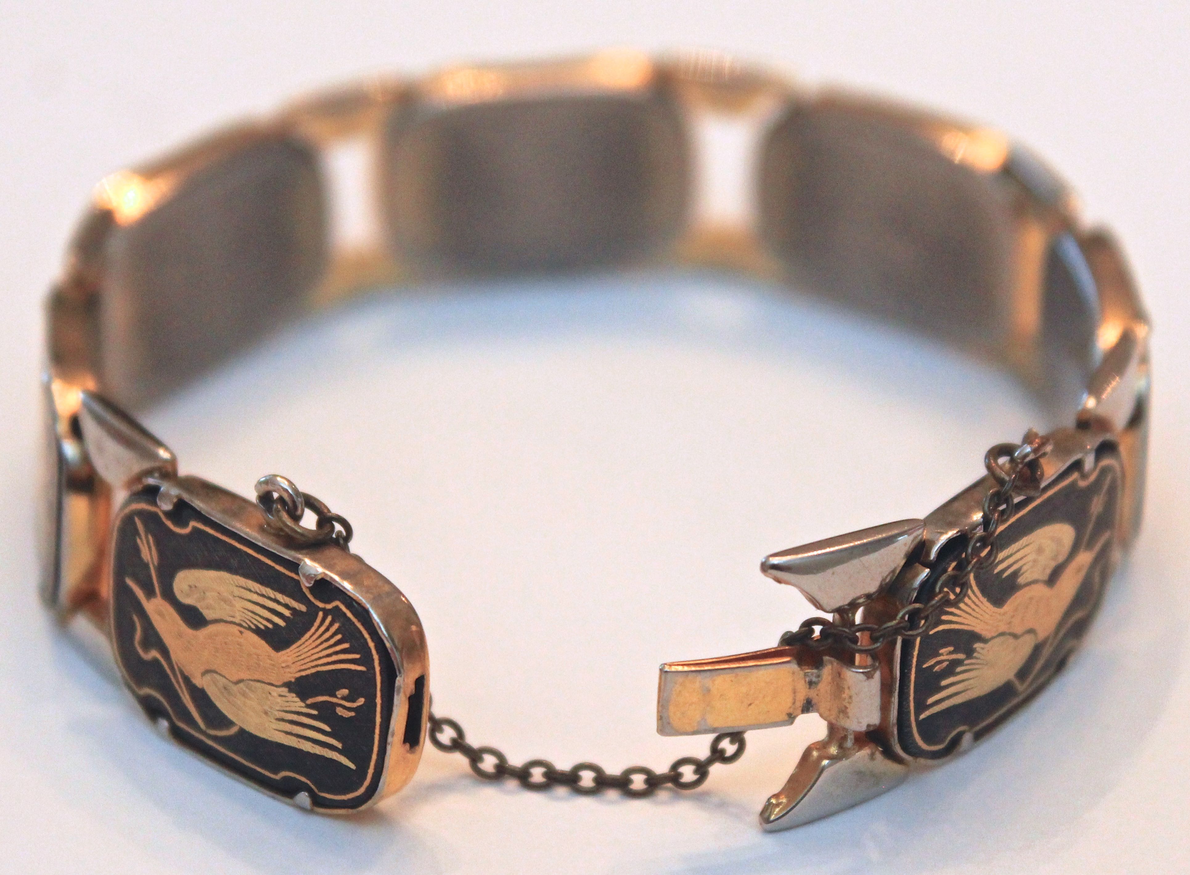 Gold Toned Linked Bracelet with Enamel Insets