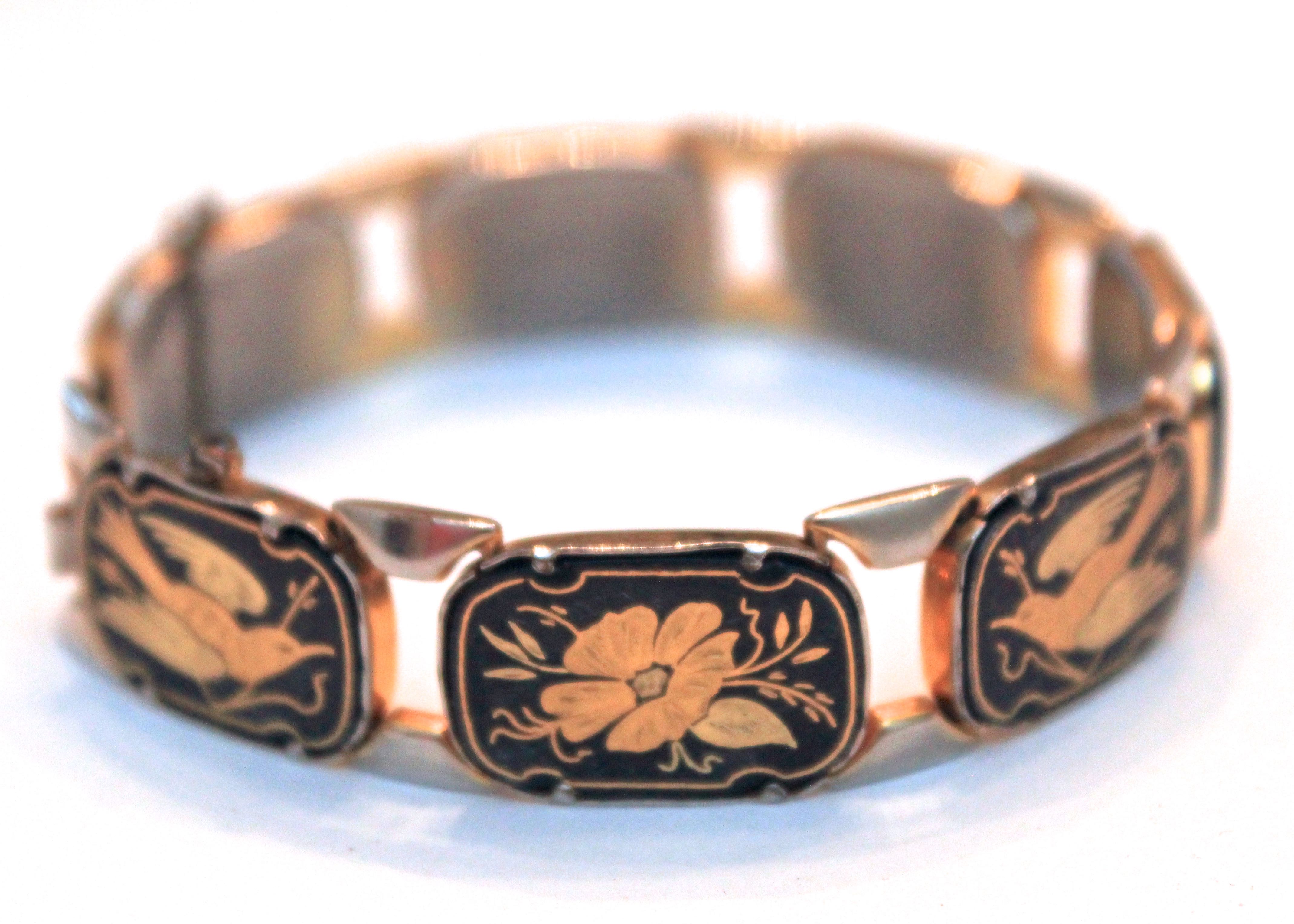 Gold Toned Linked Bracelet with Enamel Insets