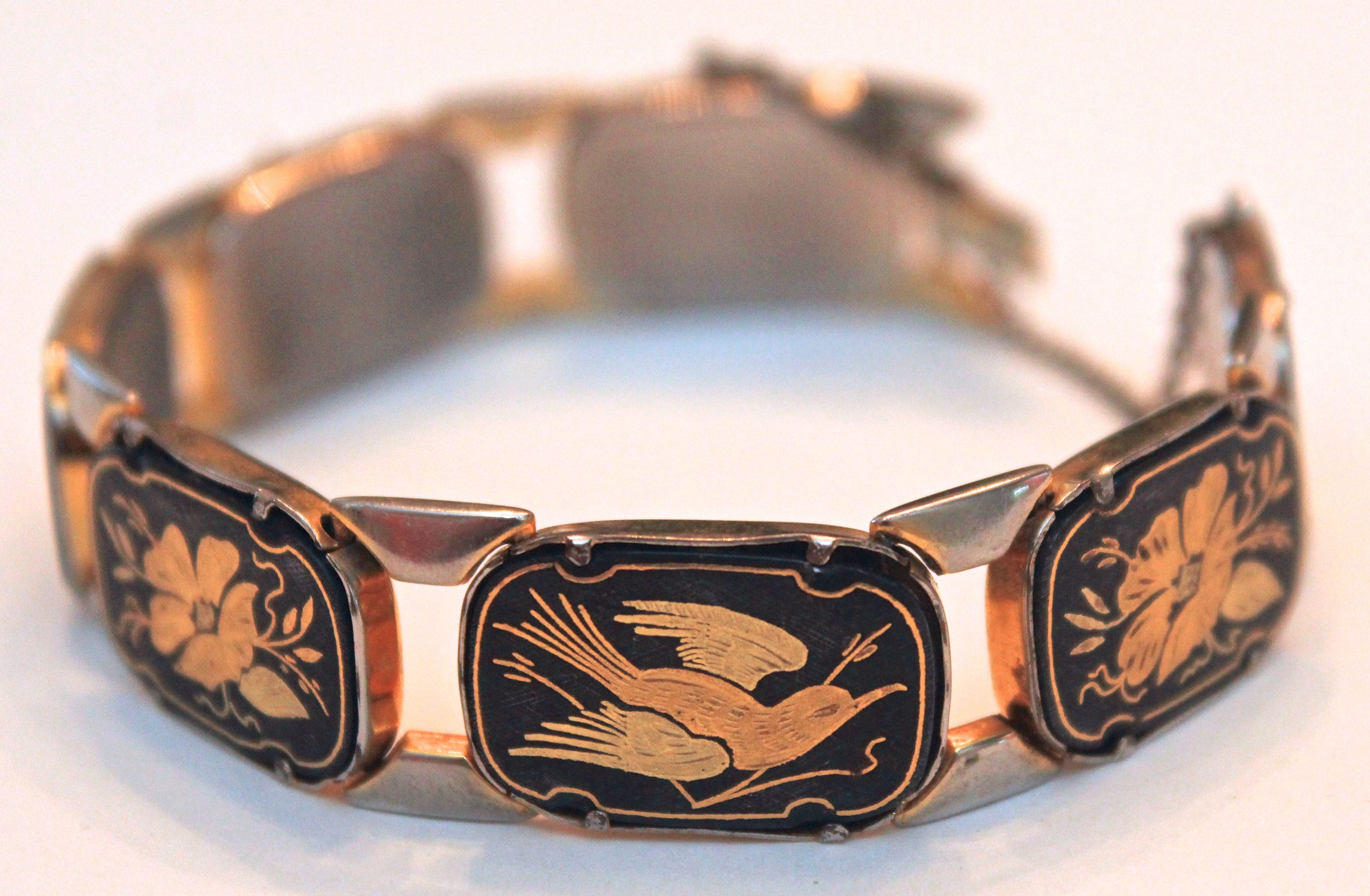 Gold Toned Linked Bracelet with Enamel Insets