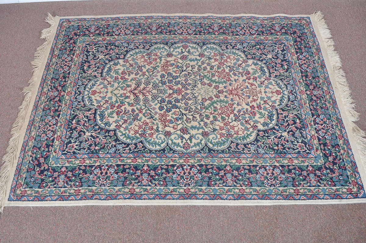 Area Rug with Floral Design