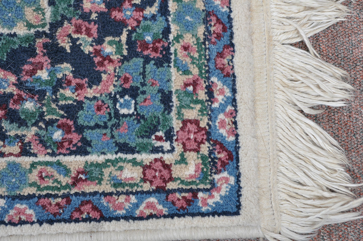 Area Rug with Floral Design