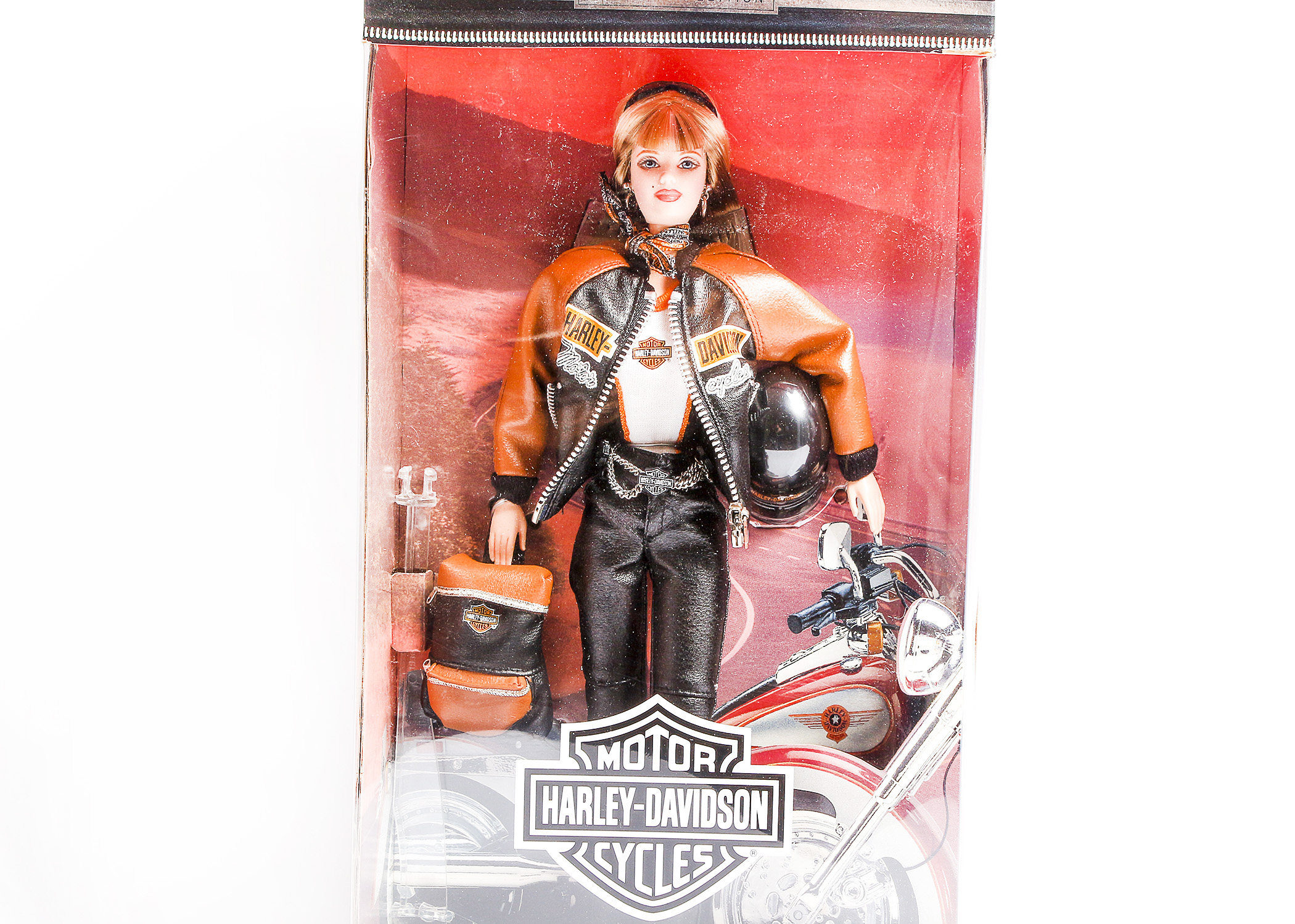 Trio of Harley Davidson Barbie and Ken Dolls