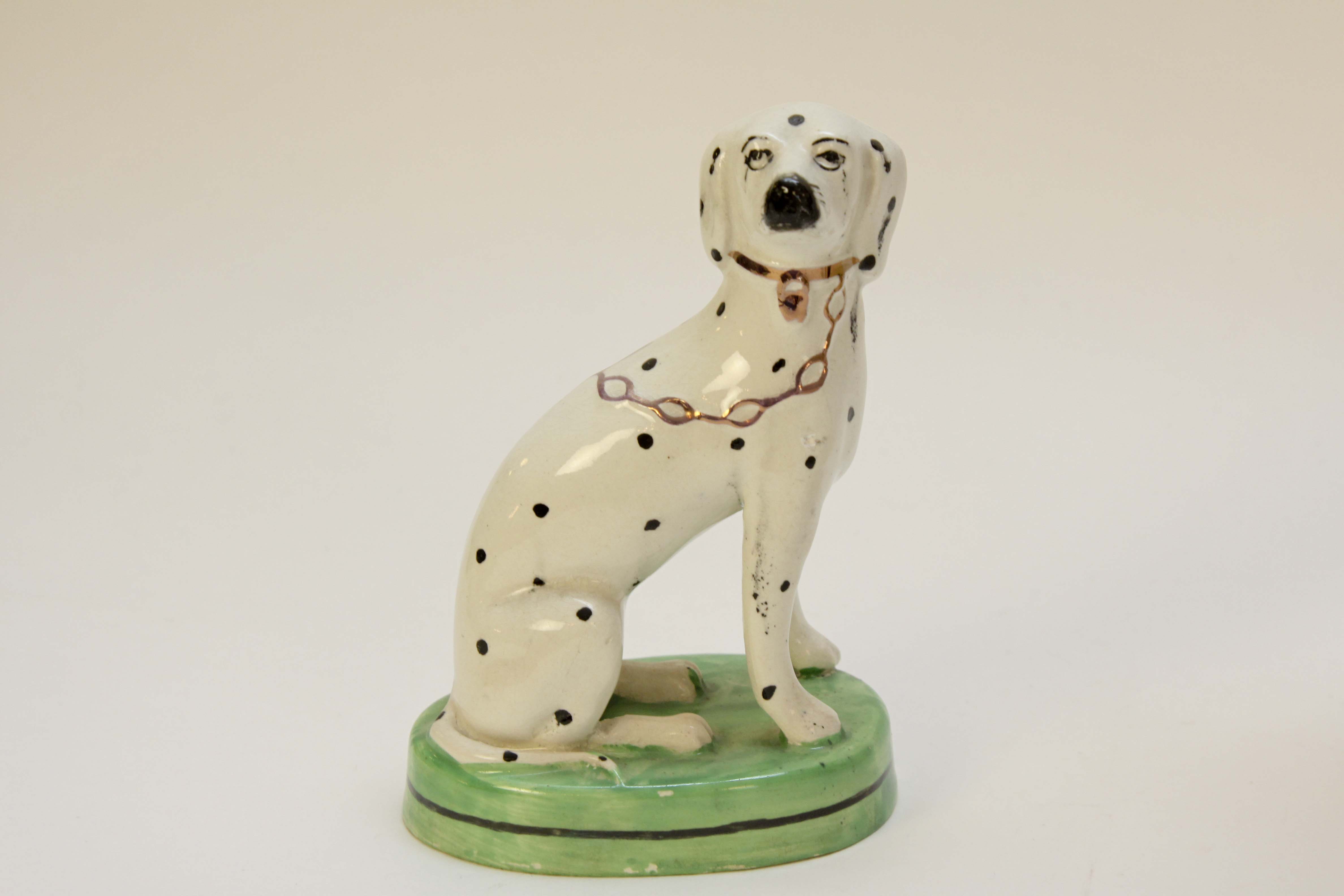 Four Vintage Porcelain Dog Figurines