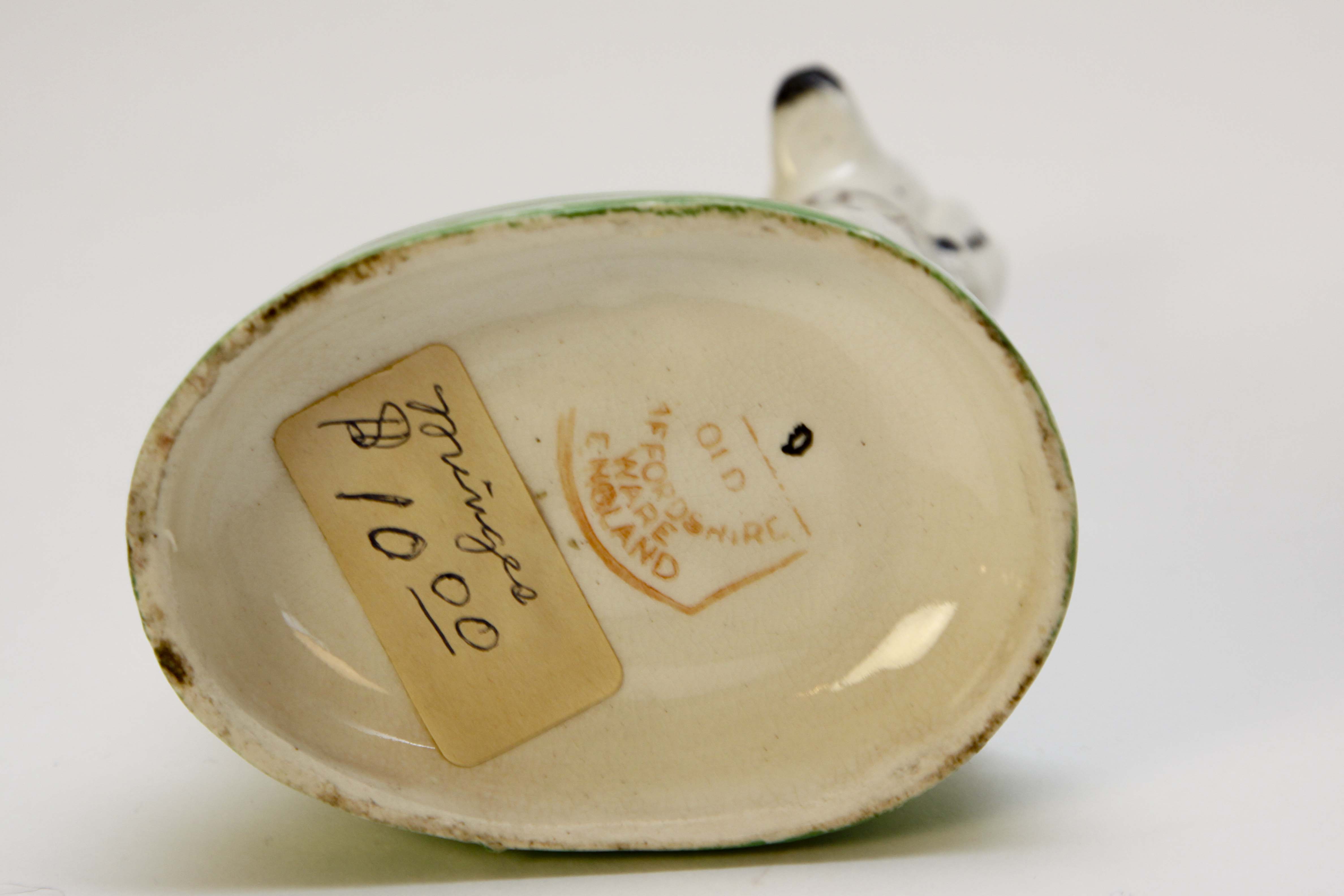 Four Vintage Porcelain Dog Figurines