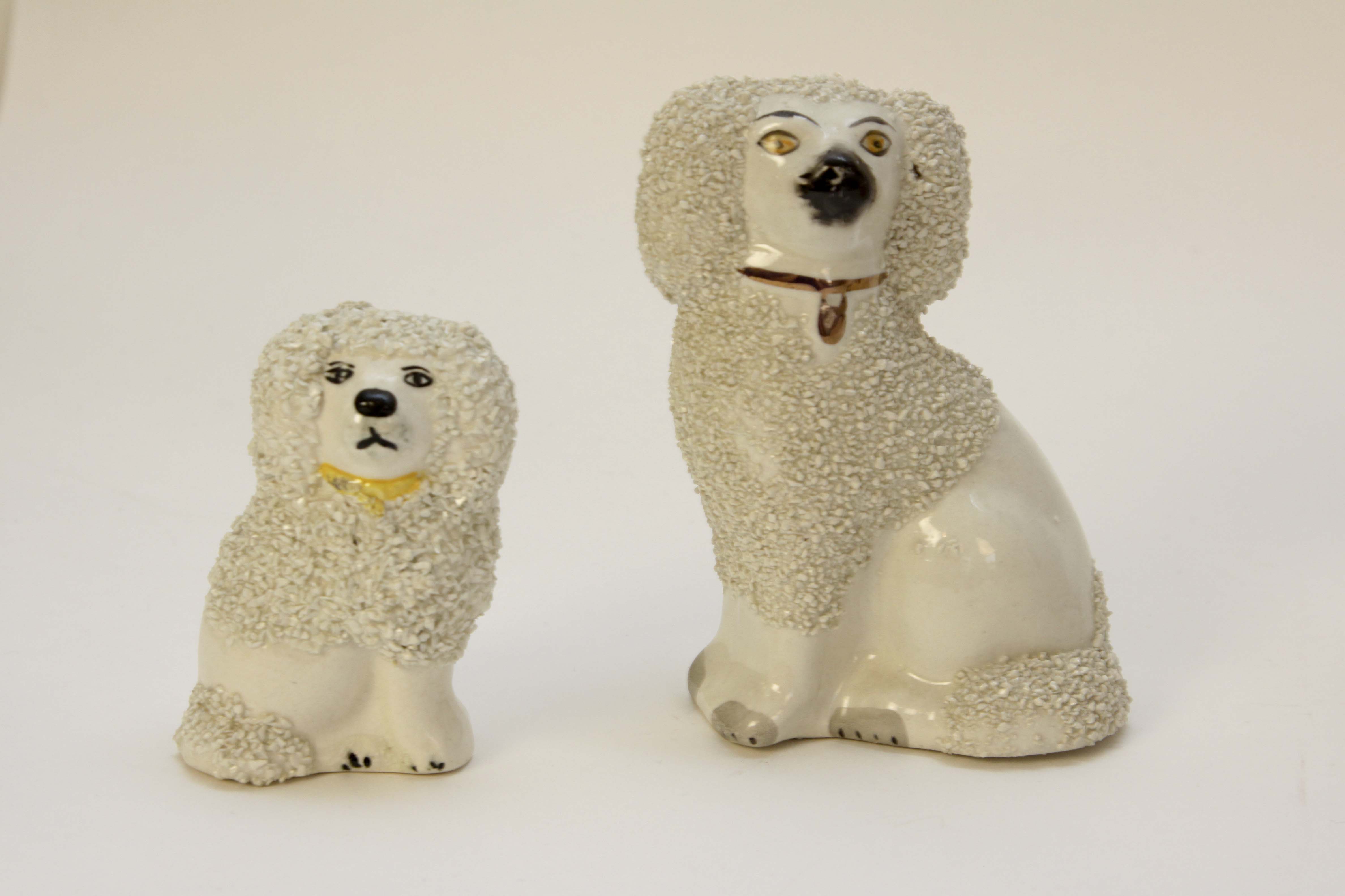 Four Vintage Porcelain Dog Figurines