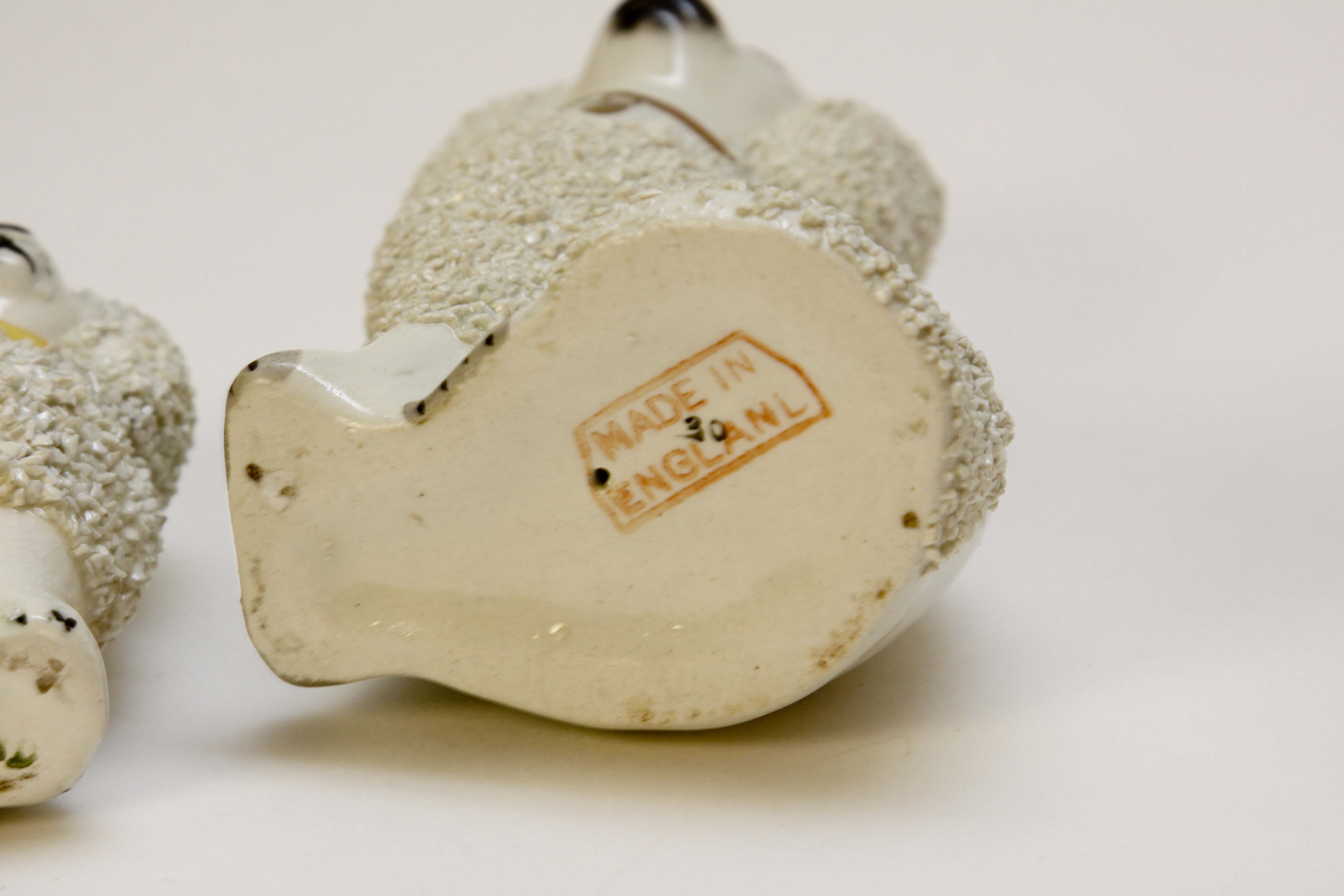 Four Vintage Porcelain Dog Figurines