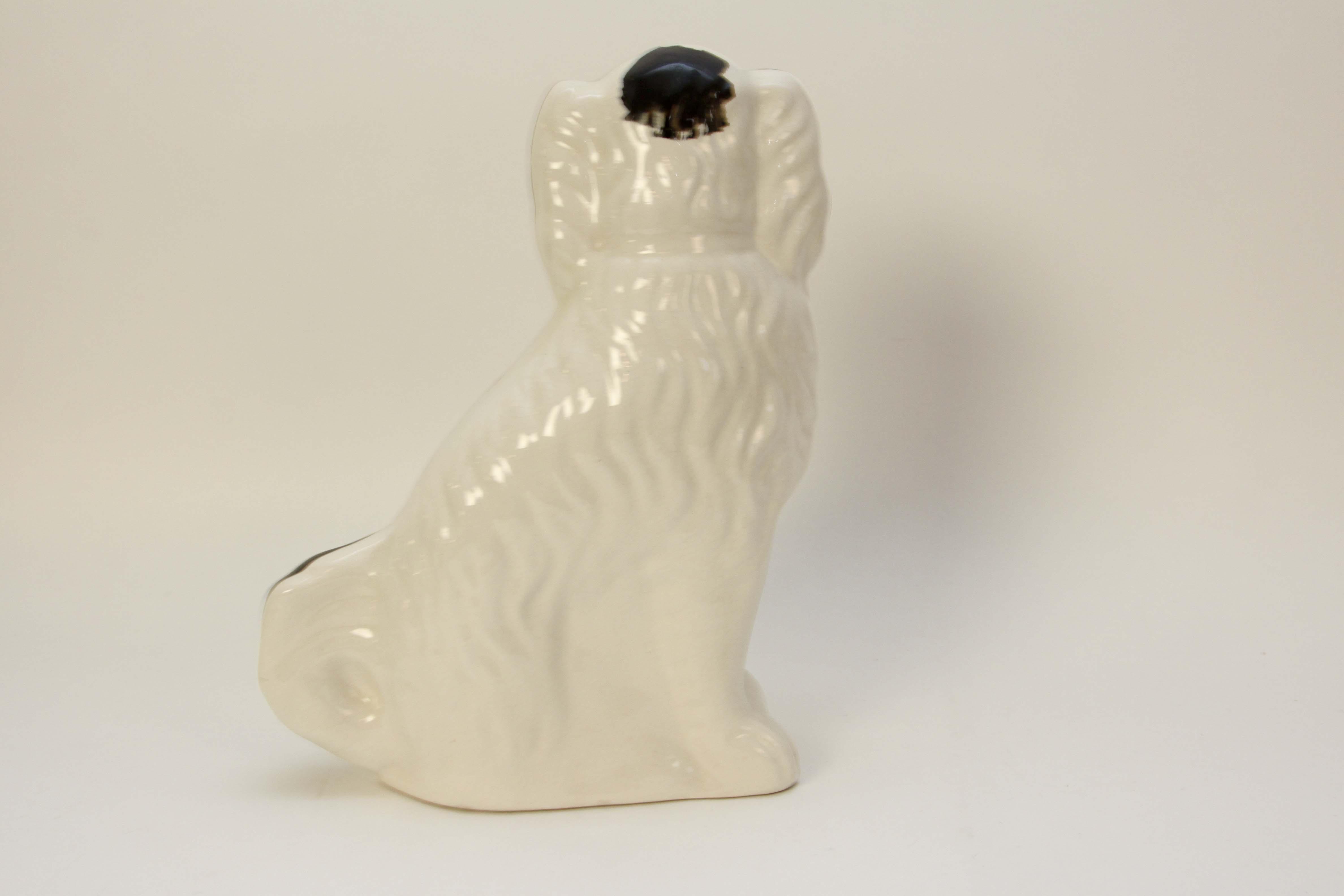 Four Vintage Porcelain Dog Figurines