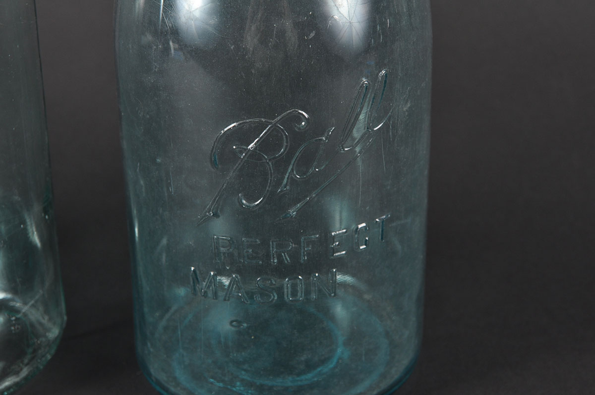 Collection of Vintage Blue Glass Mason Jars with Zinc Lids