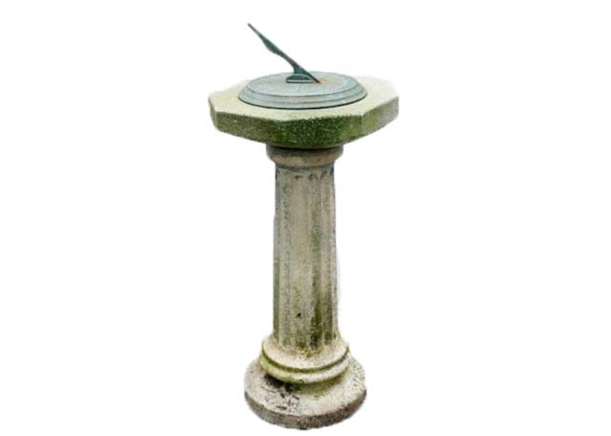 Bronze Sundial on a Weathered Cement Base