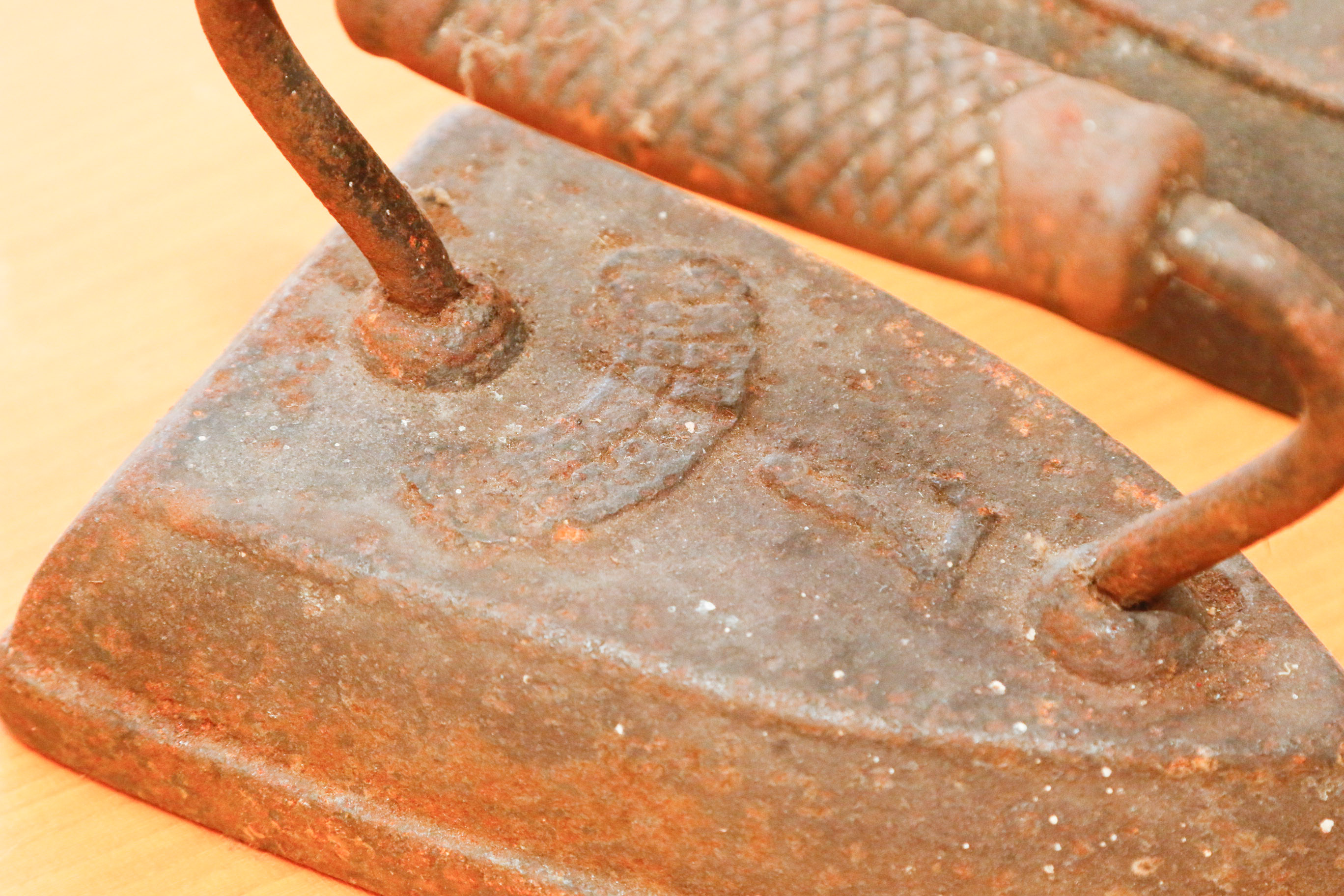 Collection of Four Antique Cast Iron Sad Irons