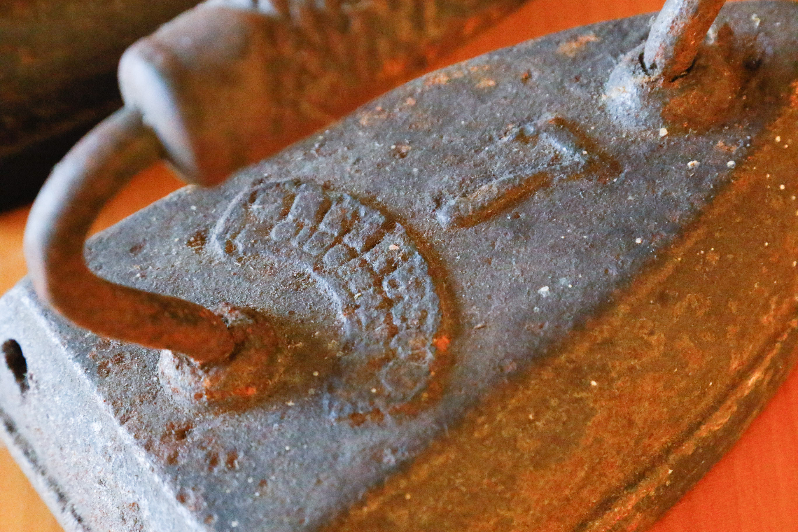 Collection of Four Antique Cast Iron Sad Irons