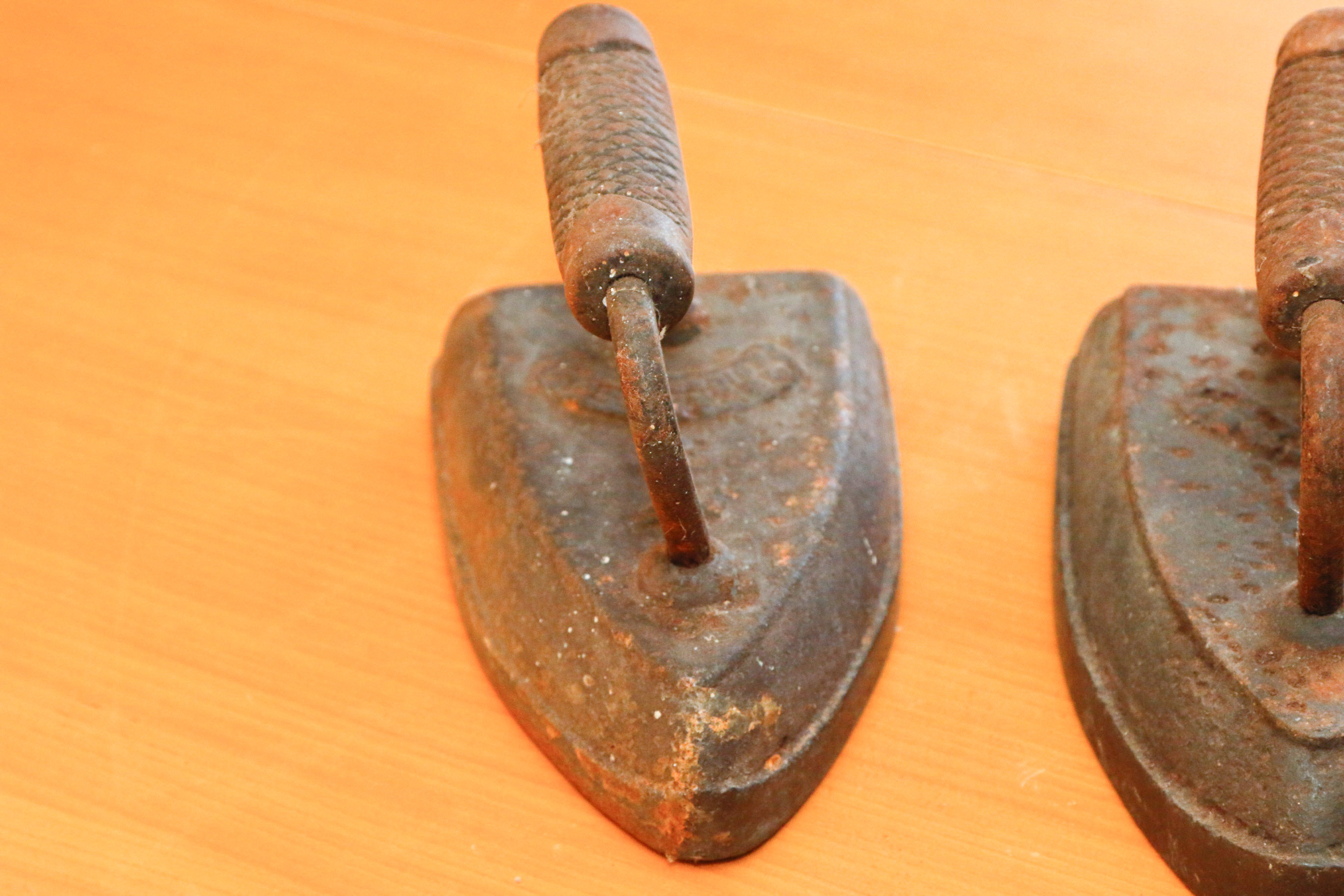 Collection of Four Antique Cast Iron Sad Irons