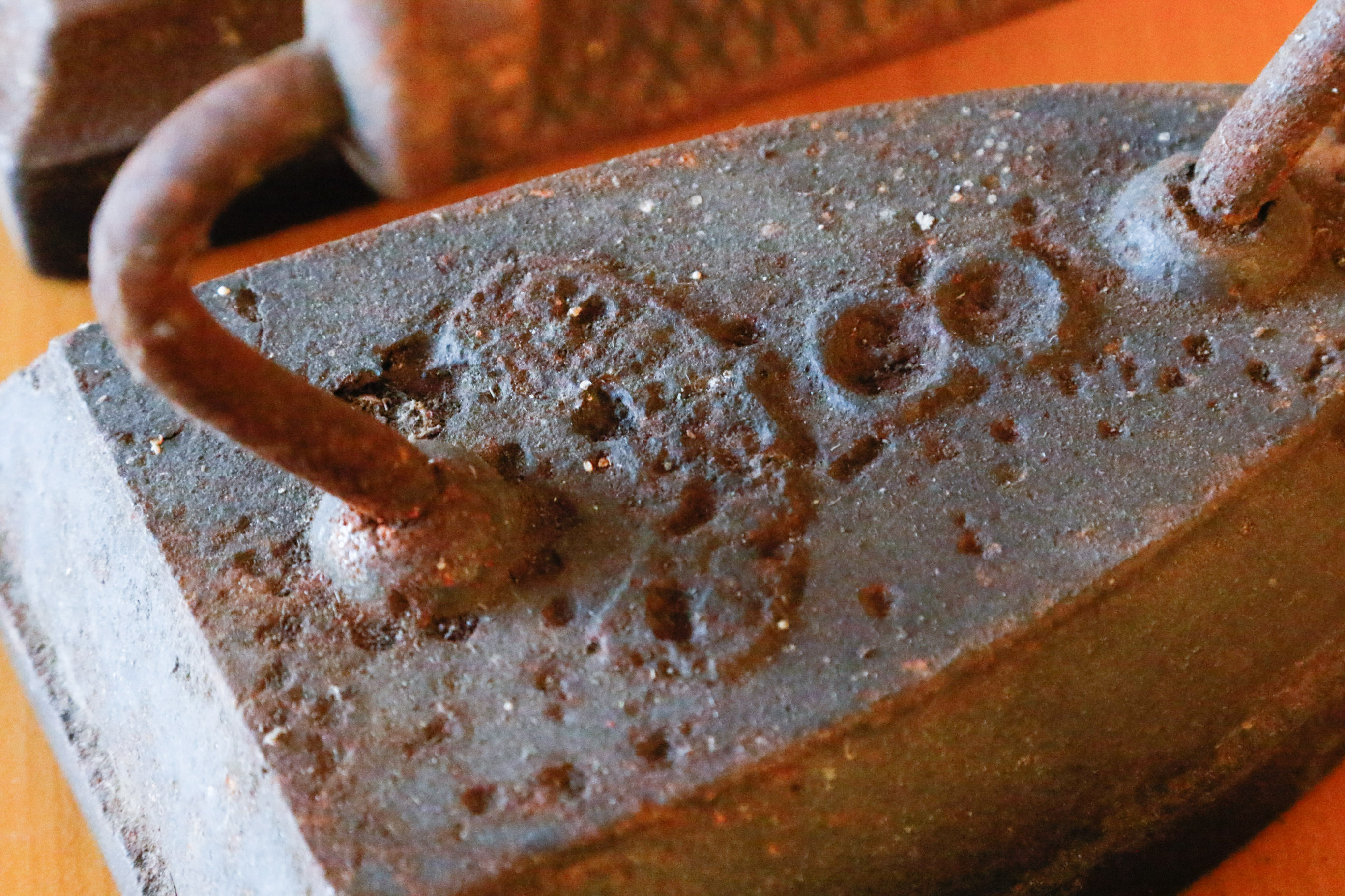 Collection of Four Antique Cast Iron Sad Irons