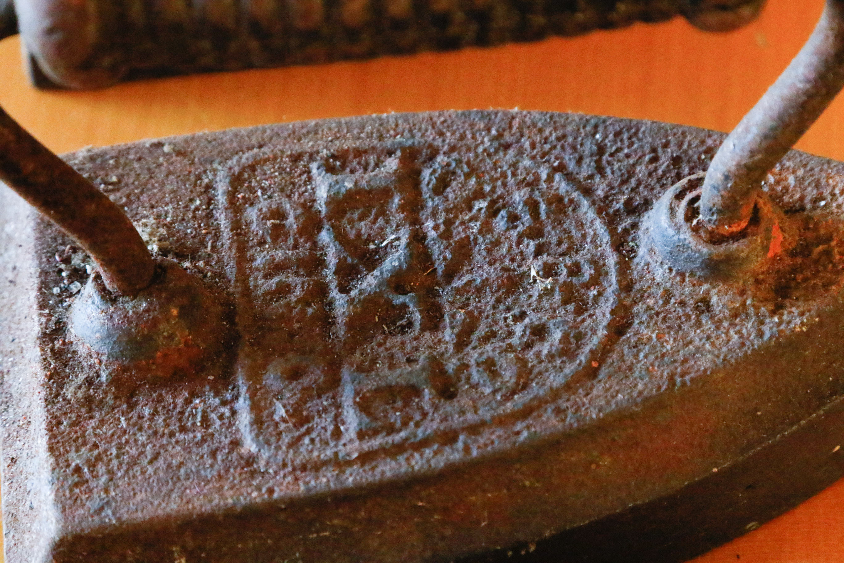 Collection of Four Antique Cast Iron Sad Irons