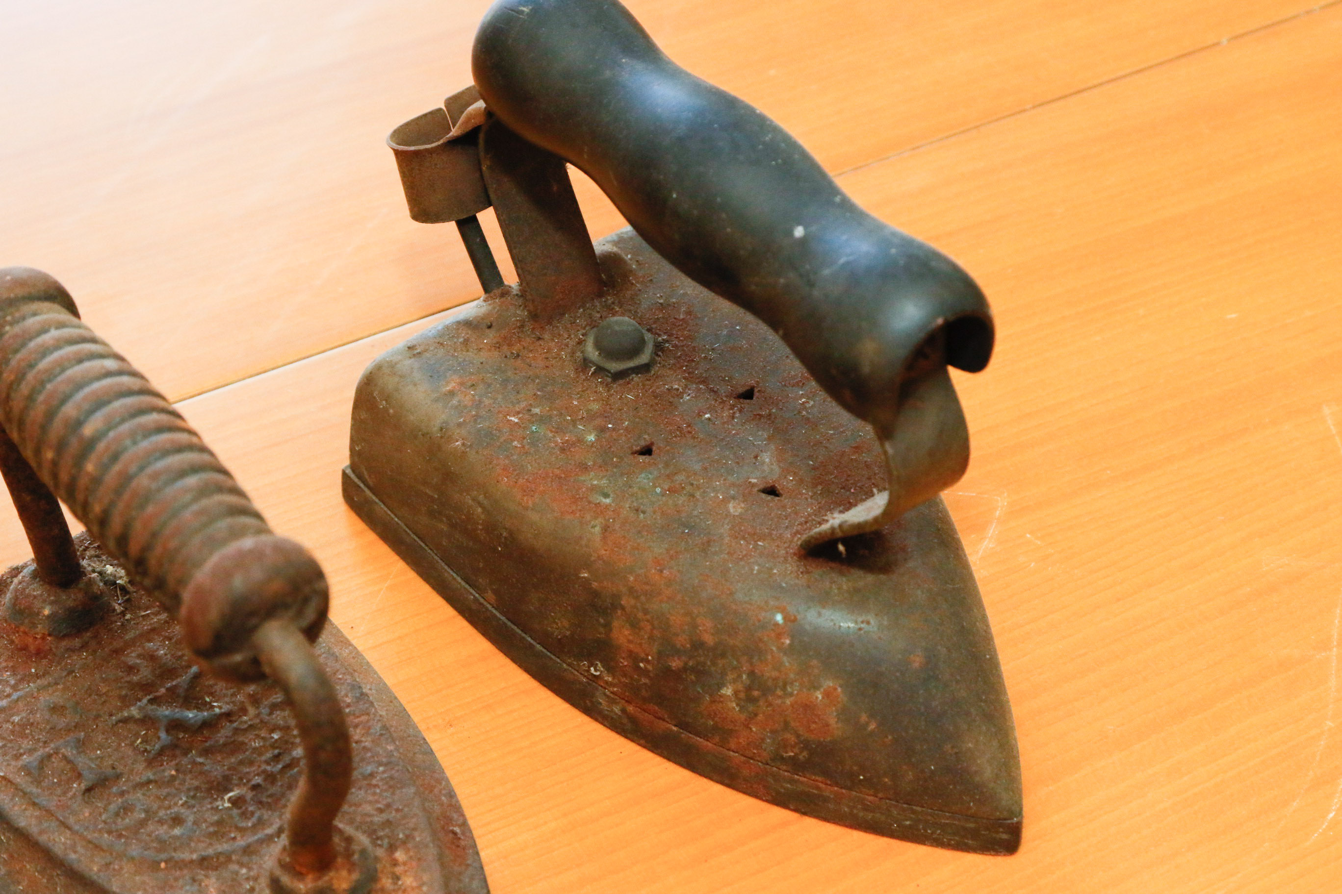 Collection of Four Antique Cast Iron Sad Irons