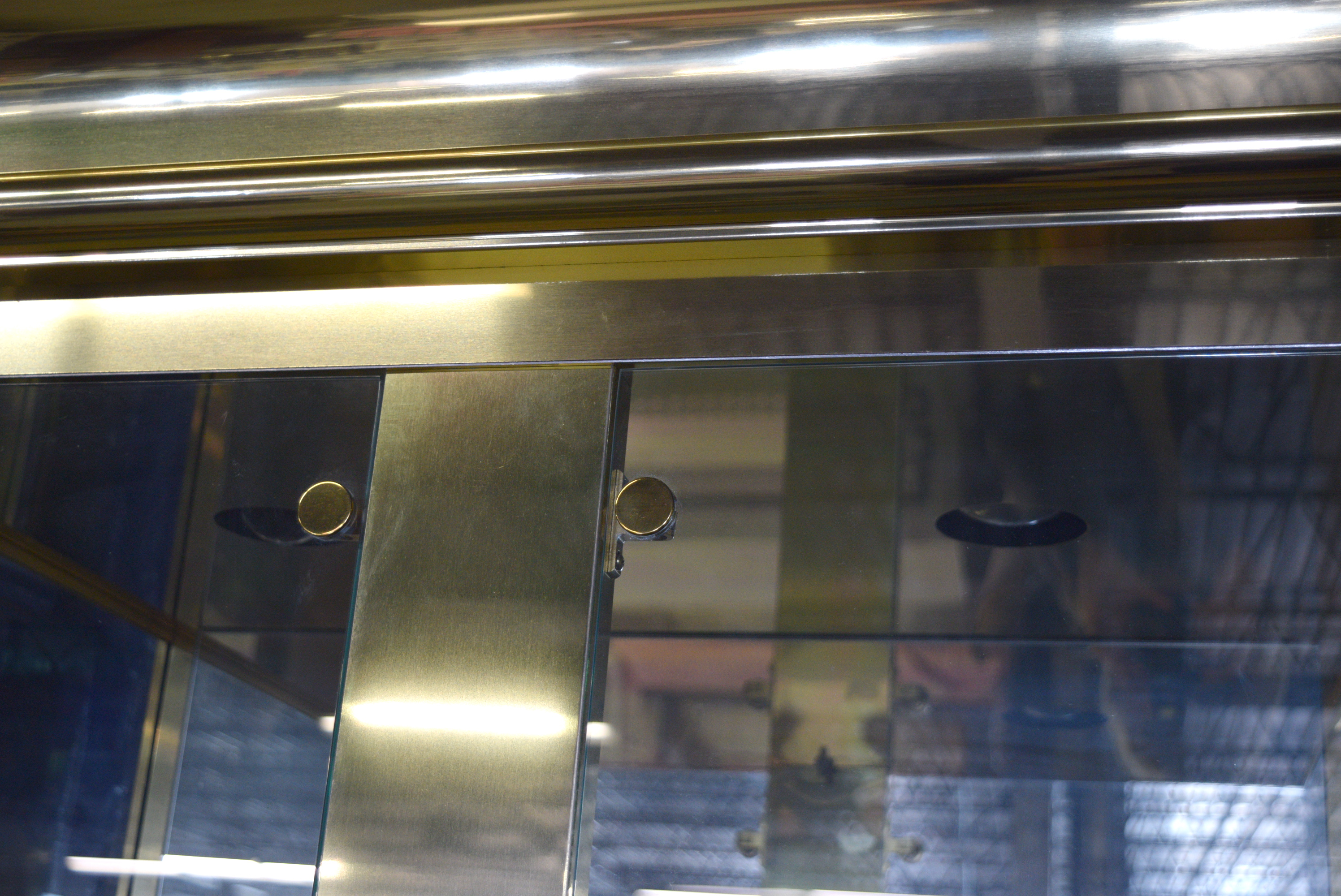 Pair of Brass and Glass Curio Cabinets