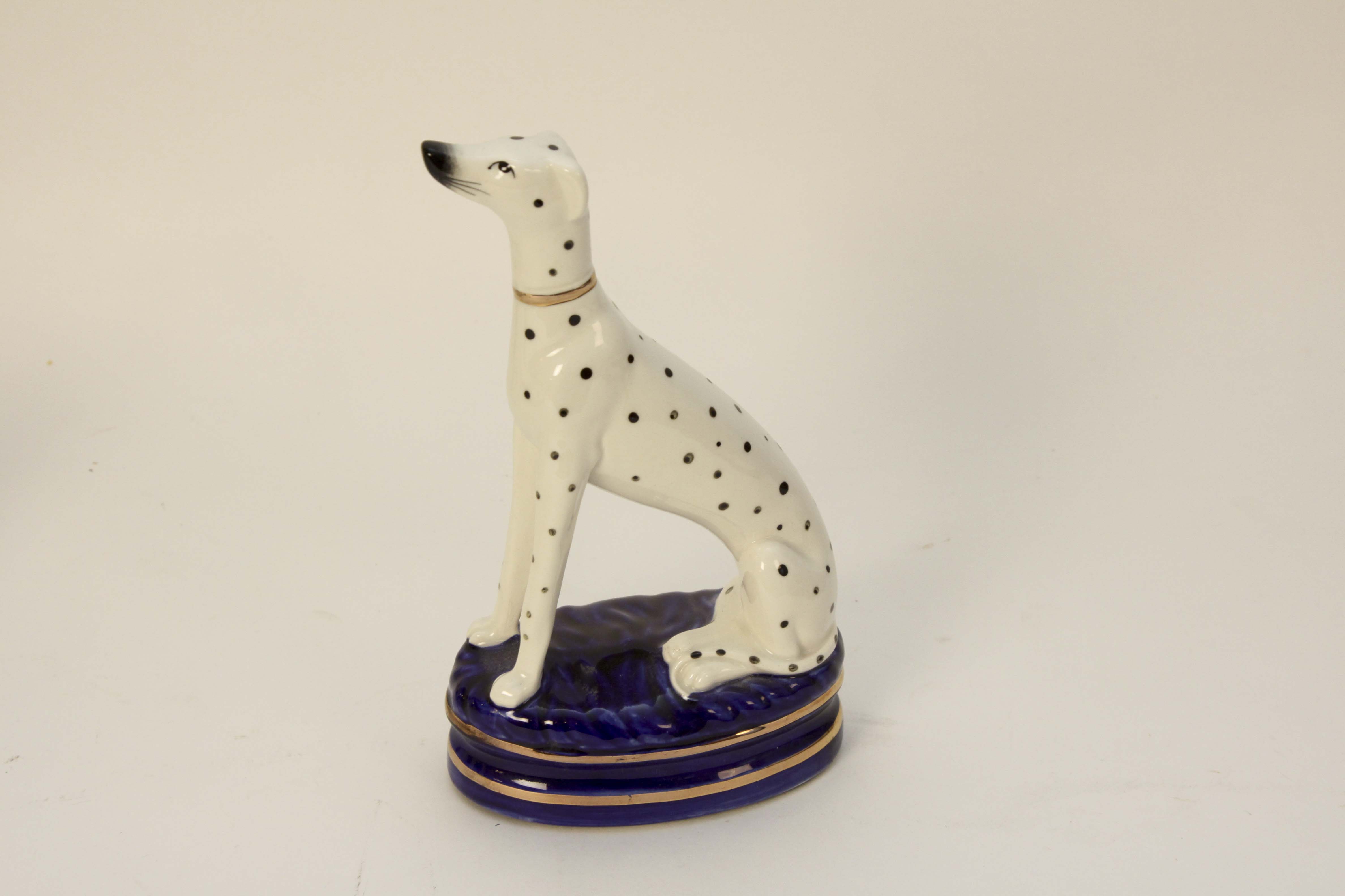 Four Vintage Porcelain Dog Figurines