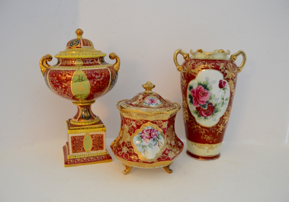 Three Decorative Ceramic Items With a Red Theme