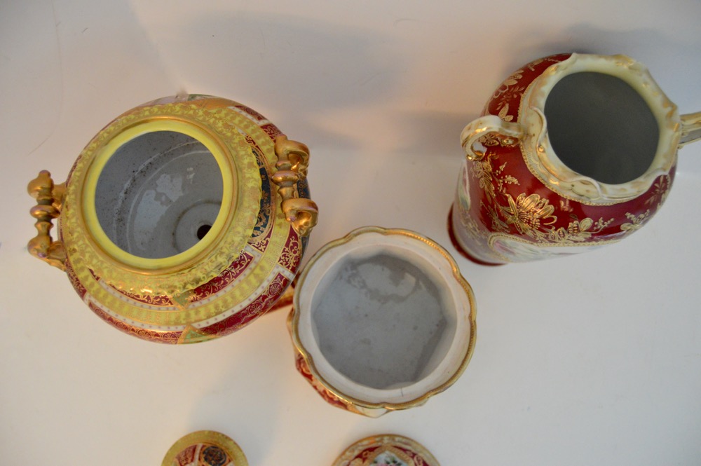 Three Decorative Ceramic Items With a Red Theme