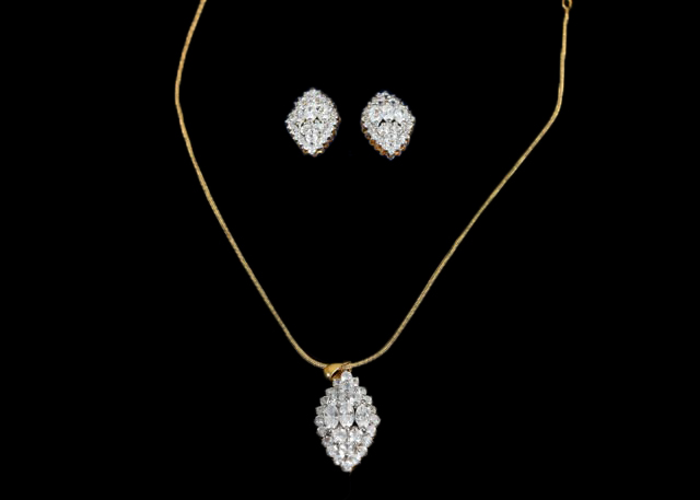 Gold-Toned and Glass Stone Earrings and Matching Necklace