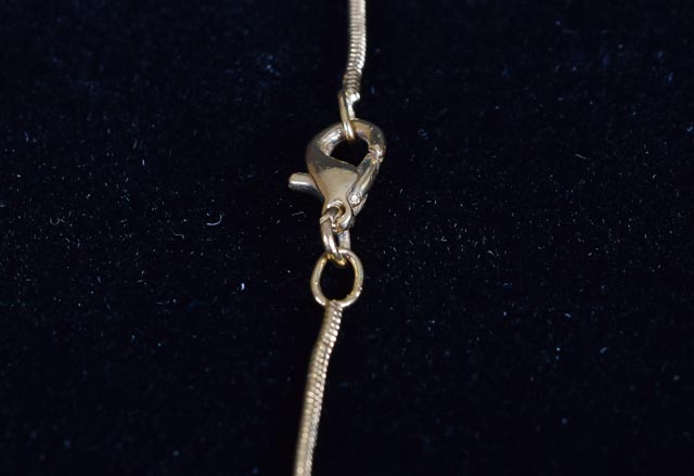 Gold-Toned and Glass Stone Earrings and Matching Necklace