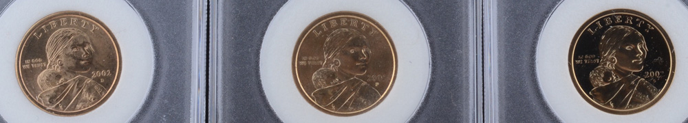 Three Encapsulated and Graded Sacagawea Golden Dollars