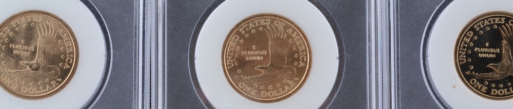 Three Encapsulated and Graded Sacagawea Golden Dollars