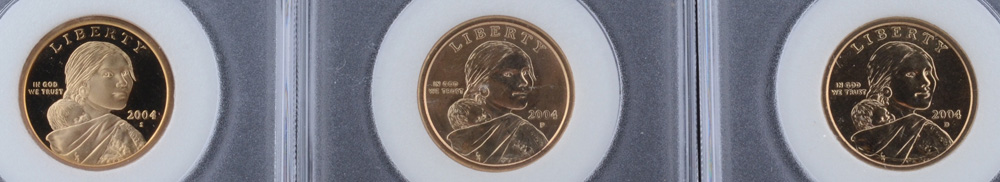 Three Encapsulated and Graded Sacagawea Golden Dollars