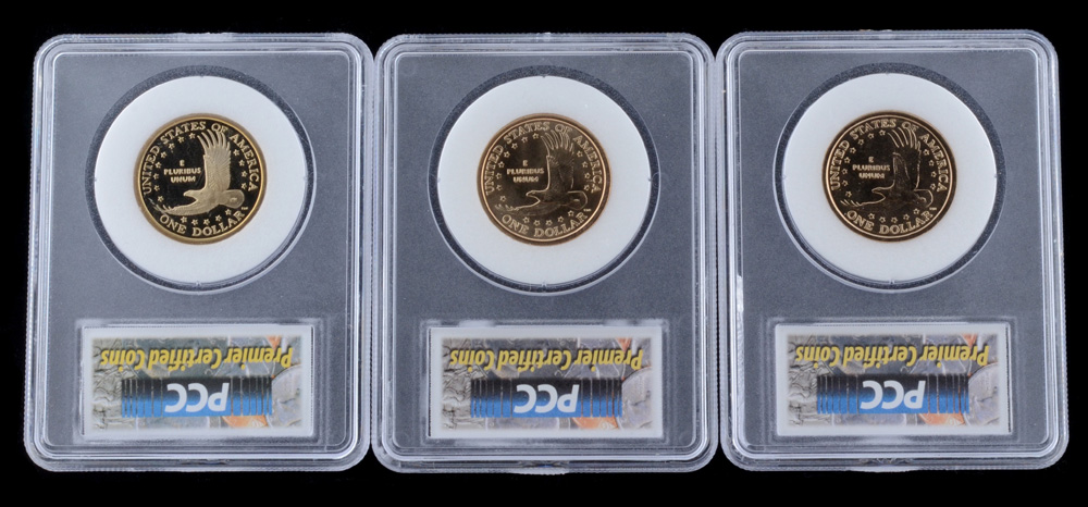 Three Encapsulated and Graded Sacagawea Golden Dollars