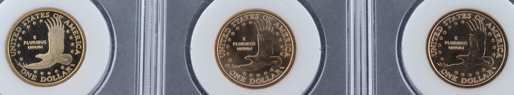 Three Encapsulated and Graded Sacagawea Golden Dollars