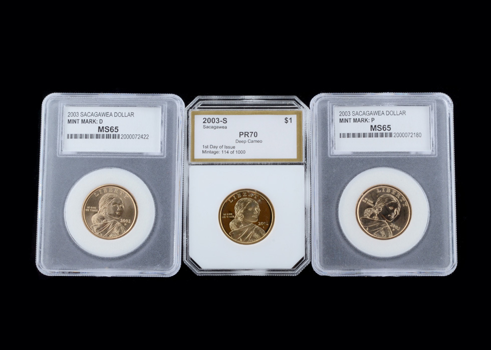Three Encapsulated and Graded Sacagawea Golden Dollars
