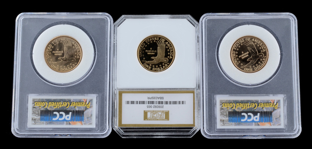 Three Encapsulated and Graded Sacagawea Golden Dollars