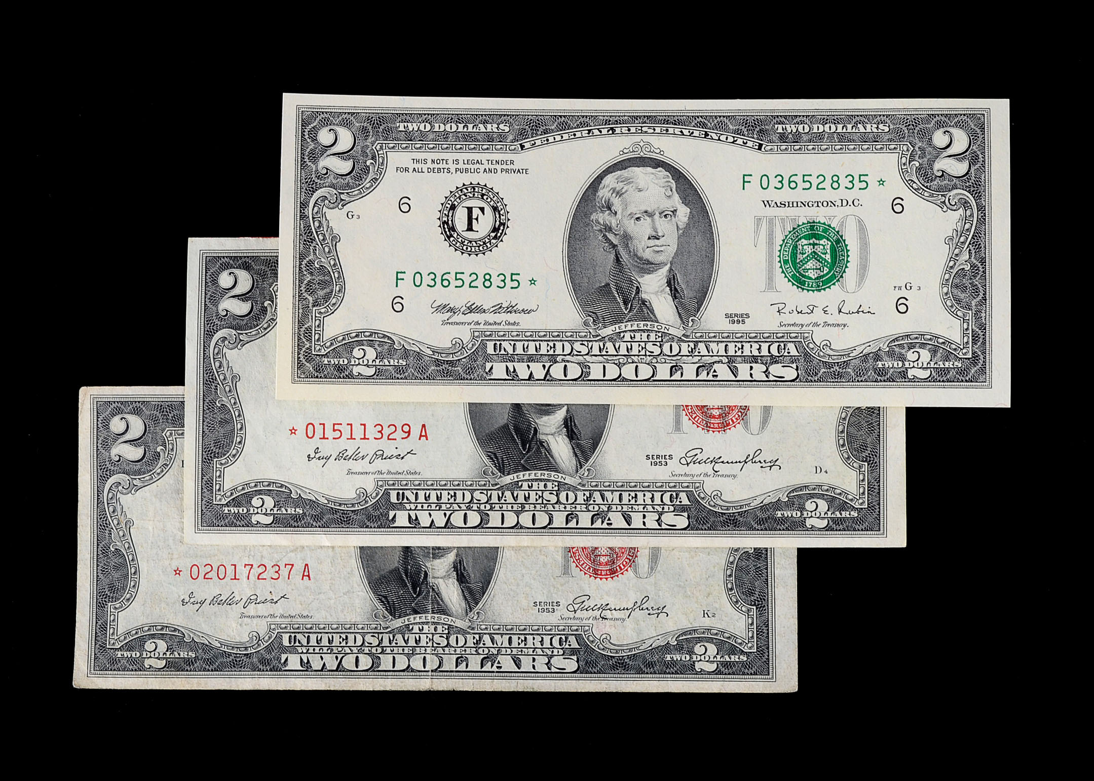 Three Various Two Dollar Bills