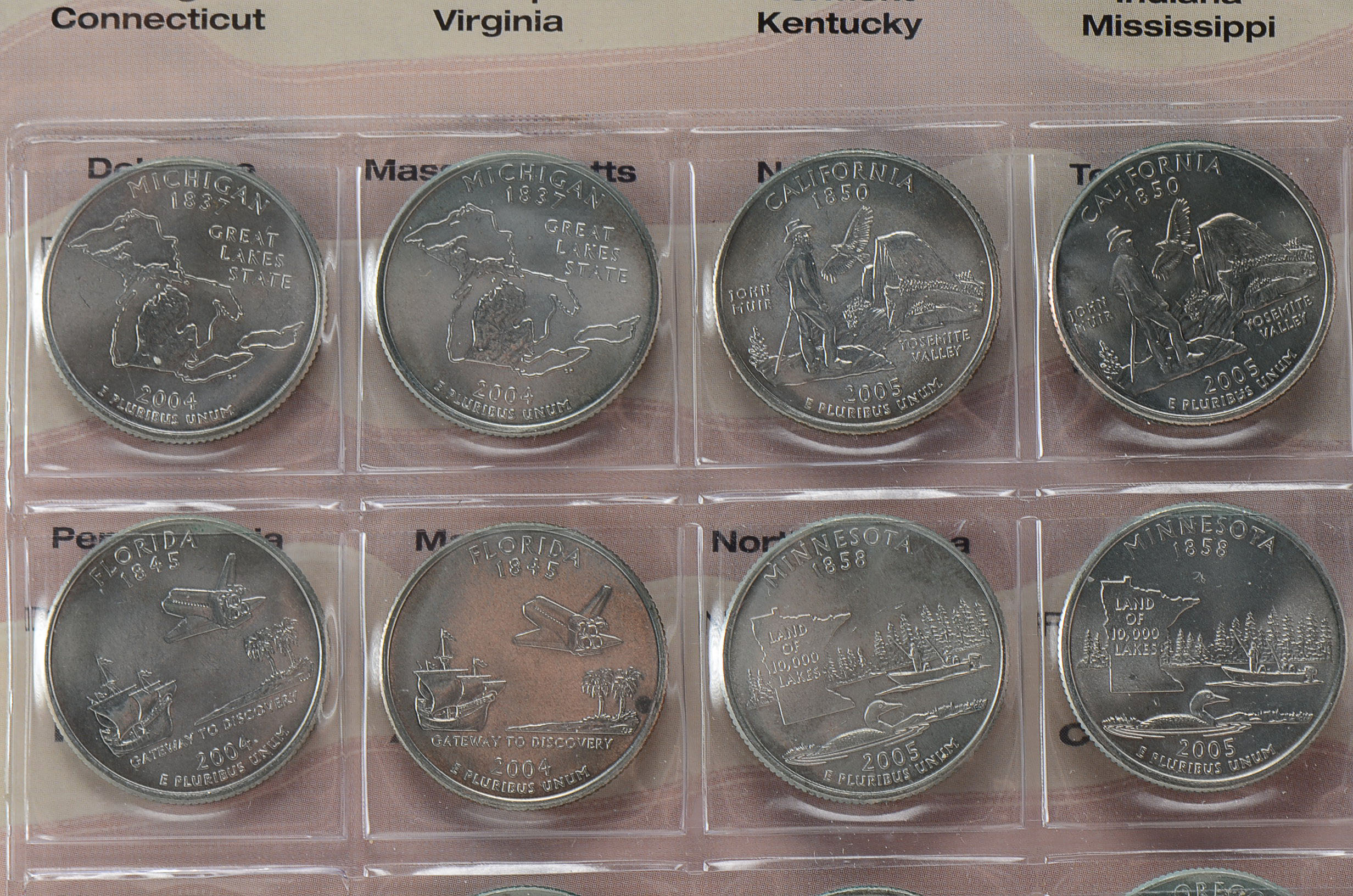 Group of 2 Washington Statehood Quarters Booklets