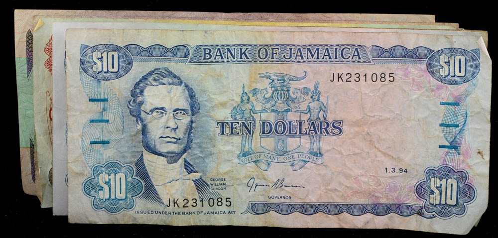 Group of (51) Pieces of Foreign Coins and Currency