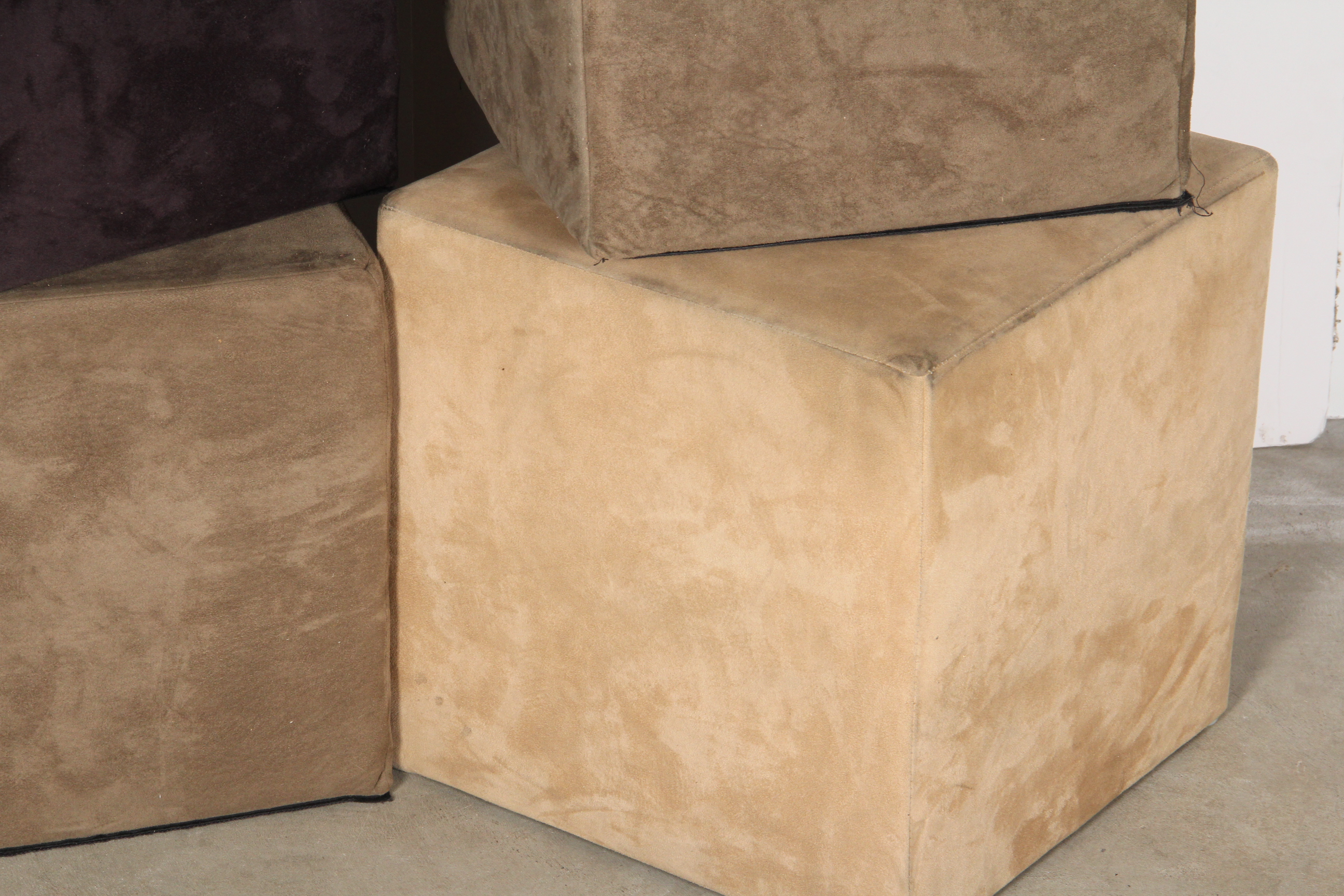 Four Small Upholstered Cubed Ottomans