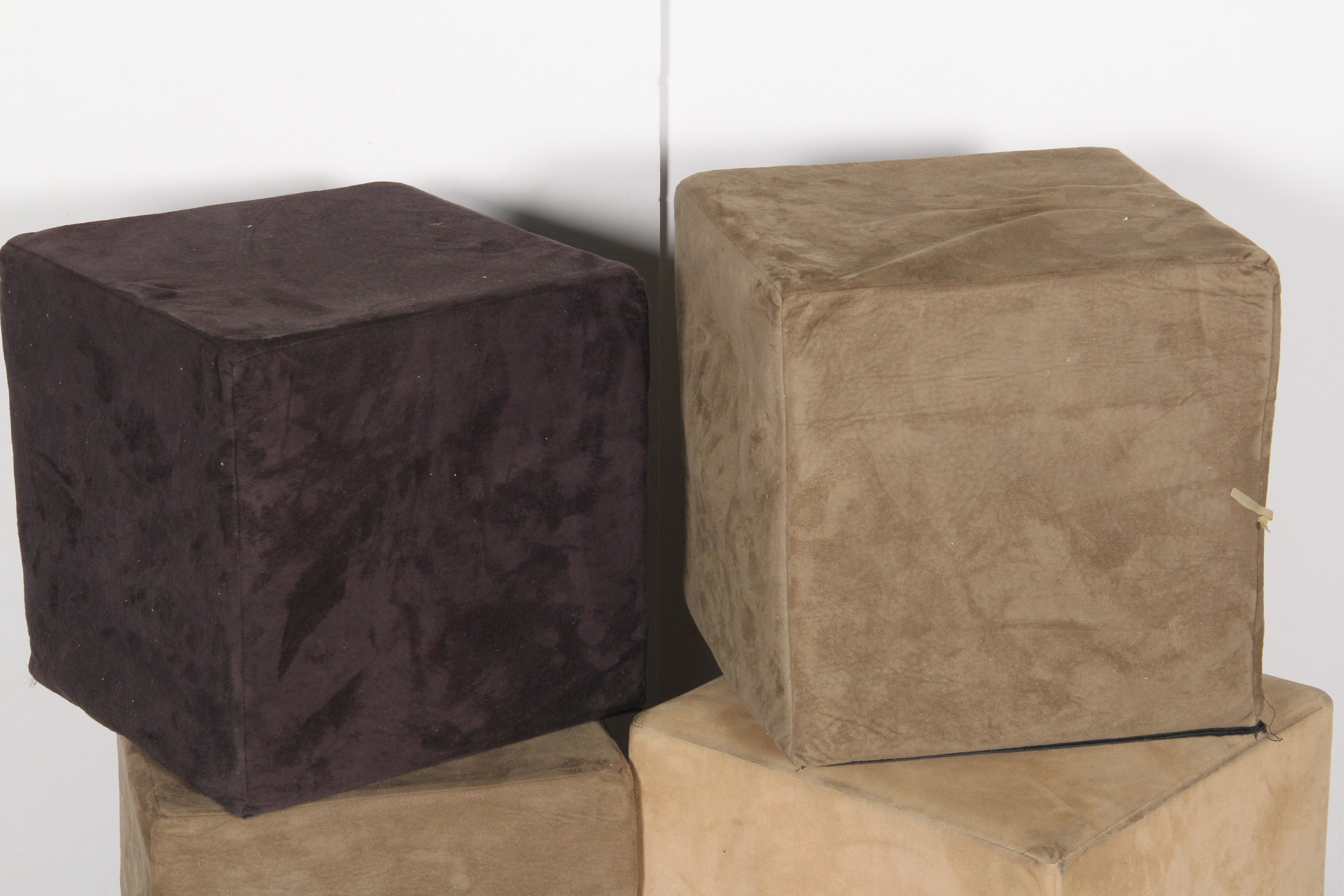 Four Small Upholstered Cubed Ottomans
