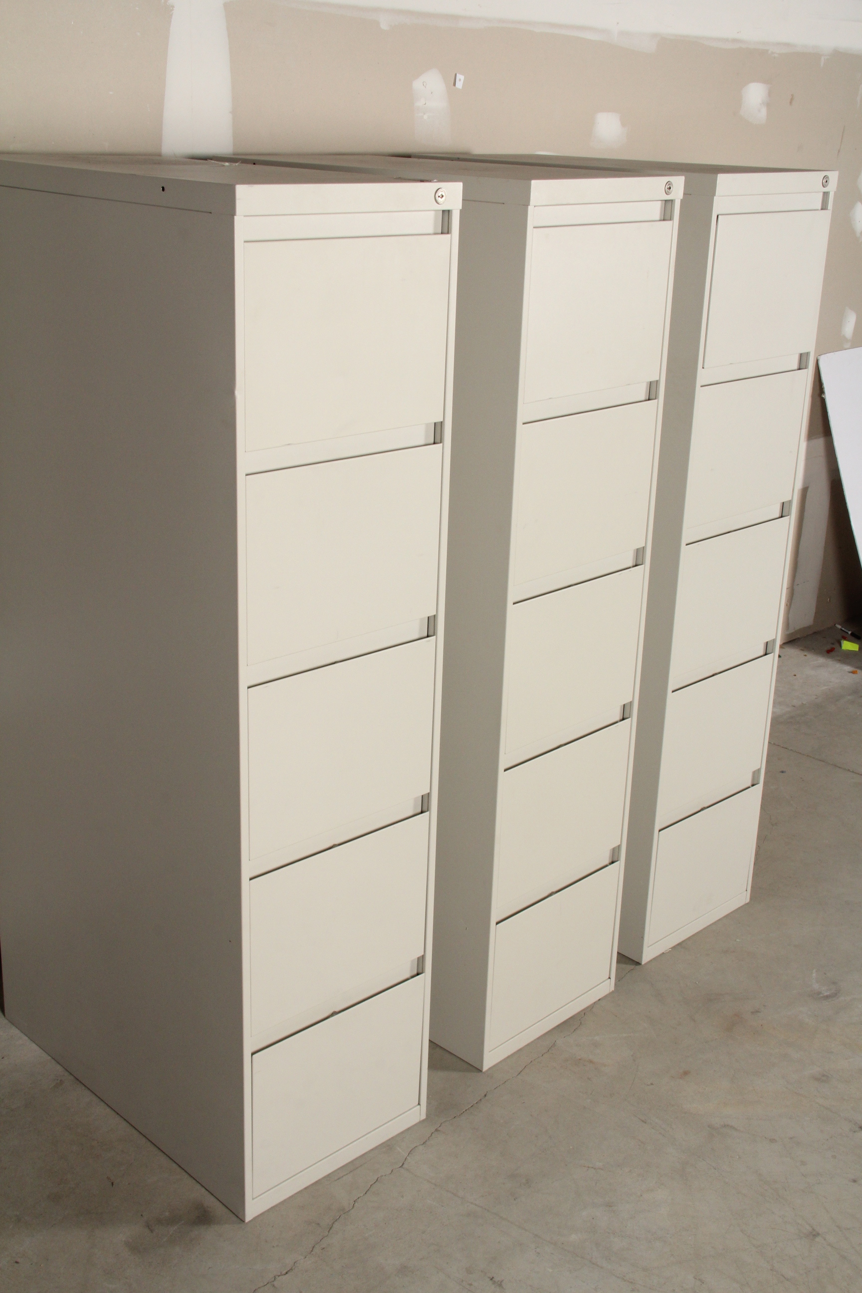 Trio of Tall Filing Cabinets