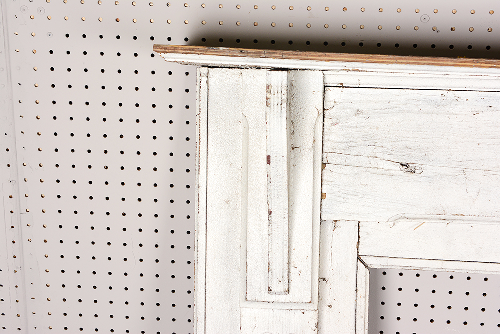 Antique Fireplace Mantel with Red Accent