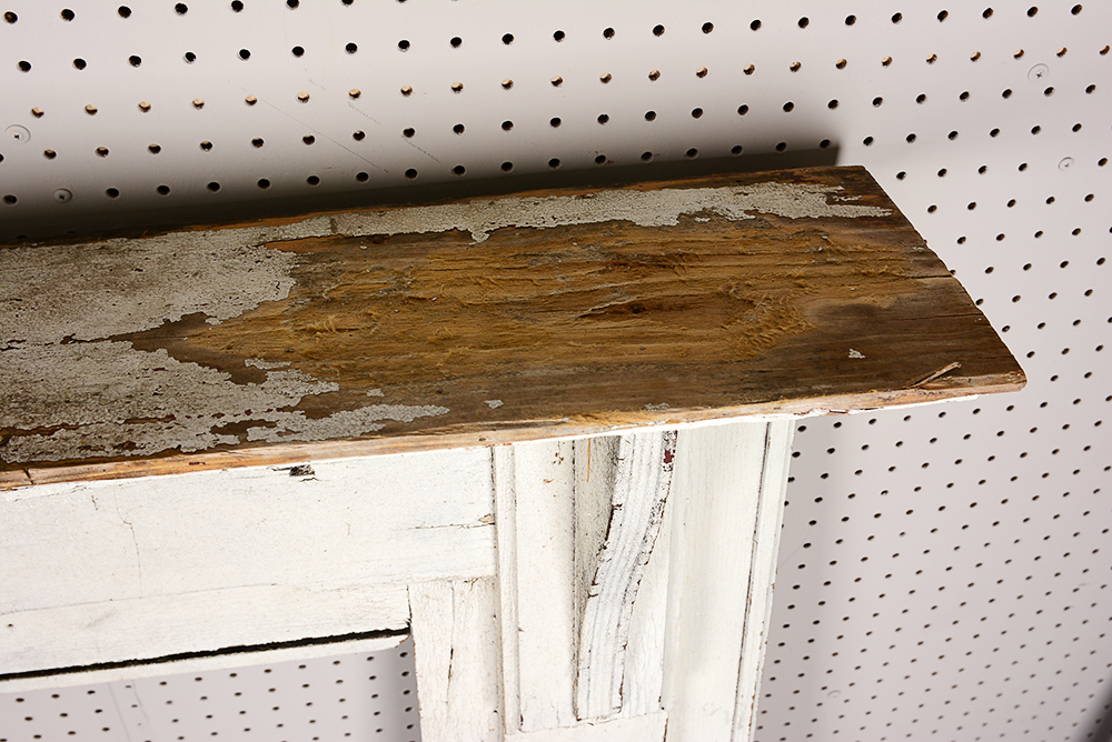 Antique Fireplace Mantel with Red Accent