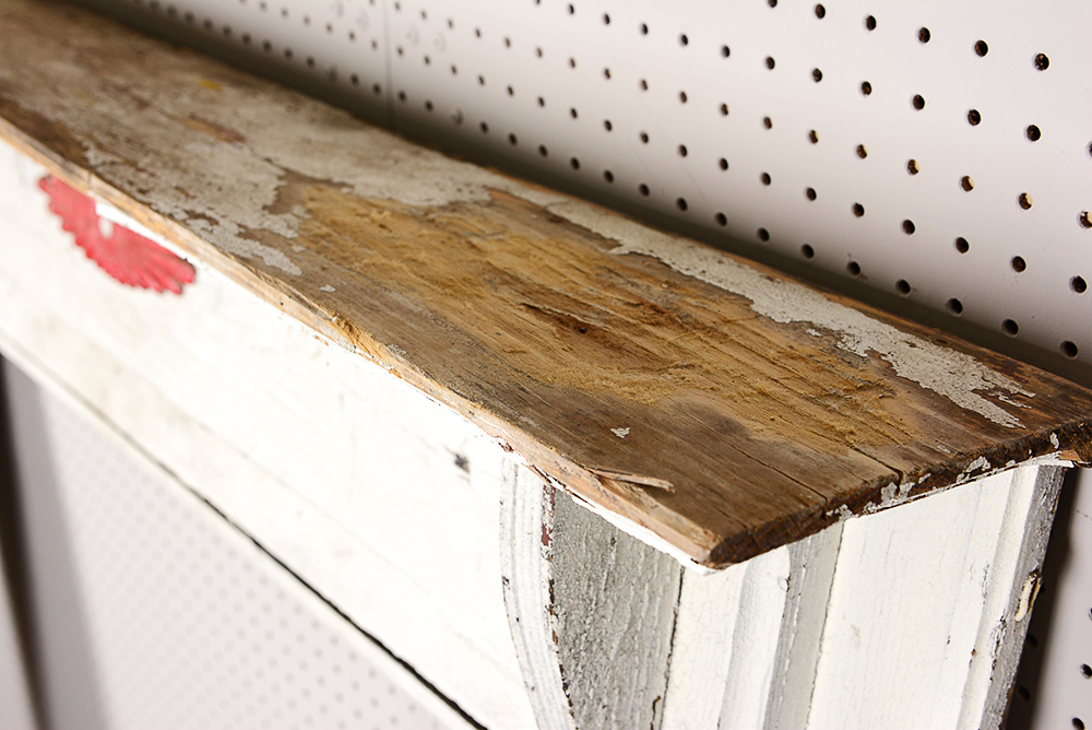 Antique Fireplace Mantel with Red Accent