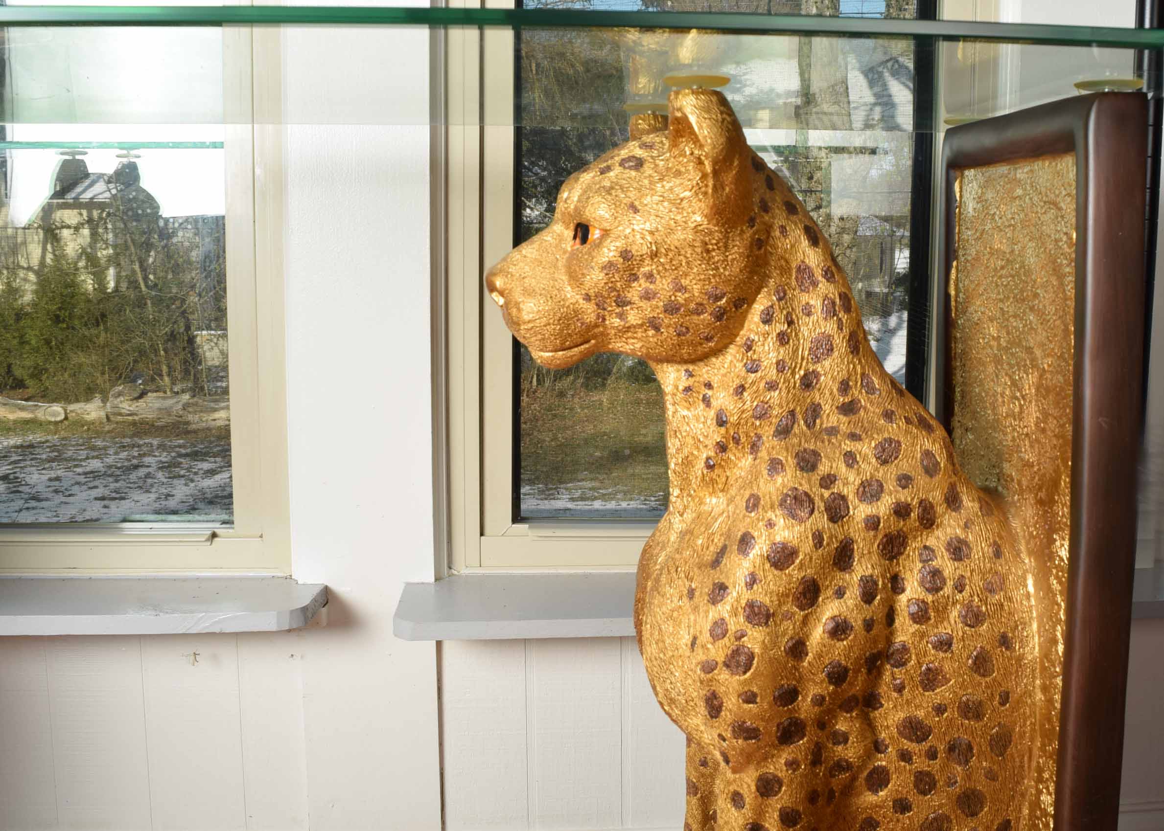 Glass Top Cheetah Base Console Table