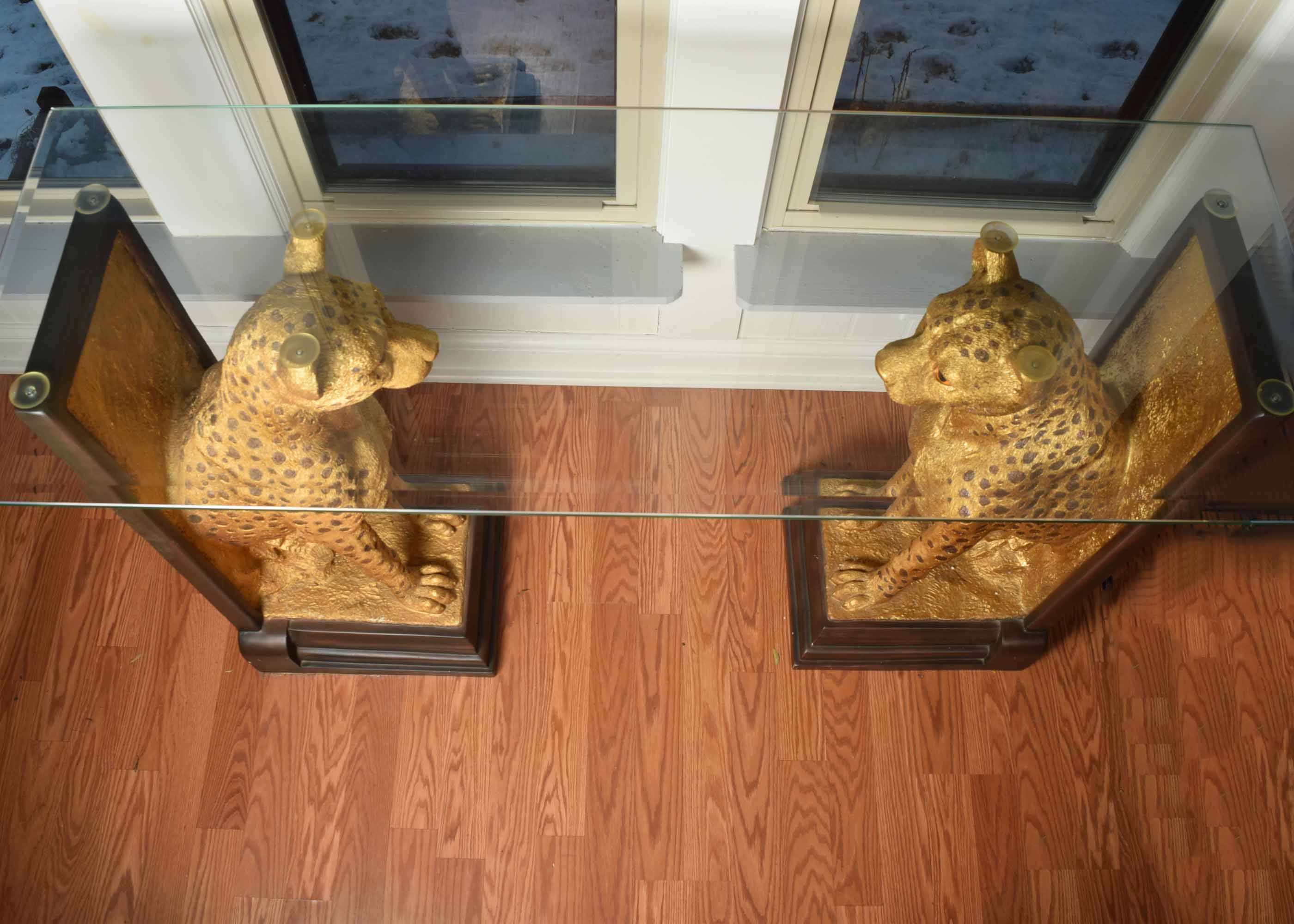 Glass Top Cheetah Base Console Table