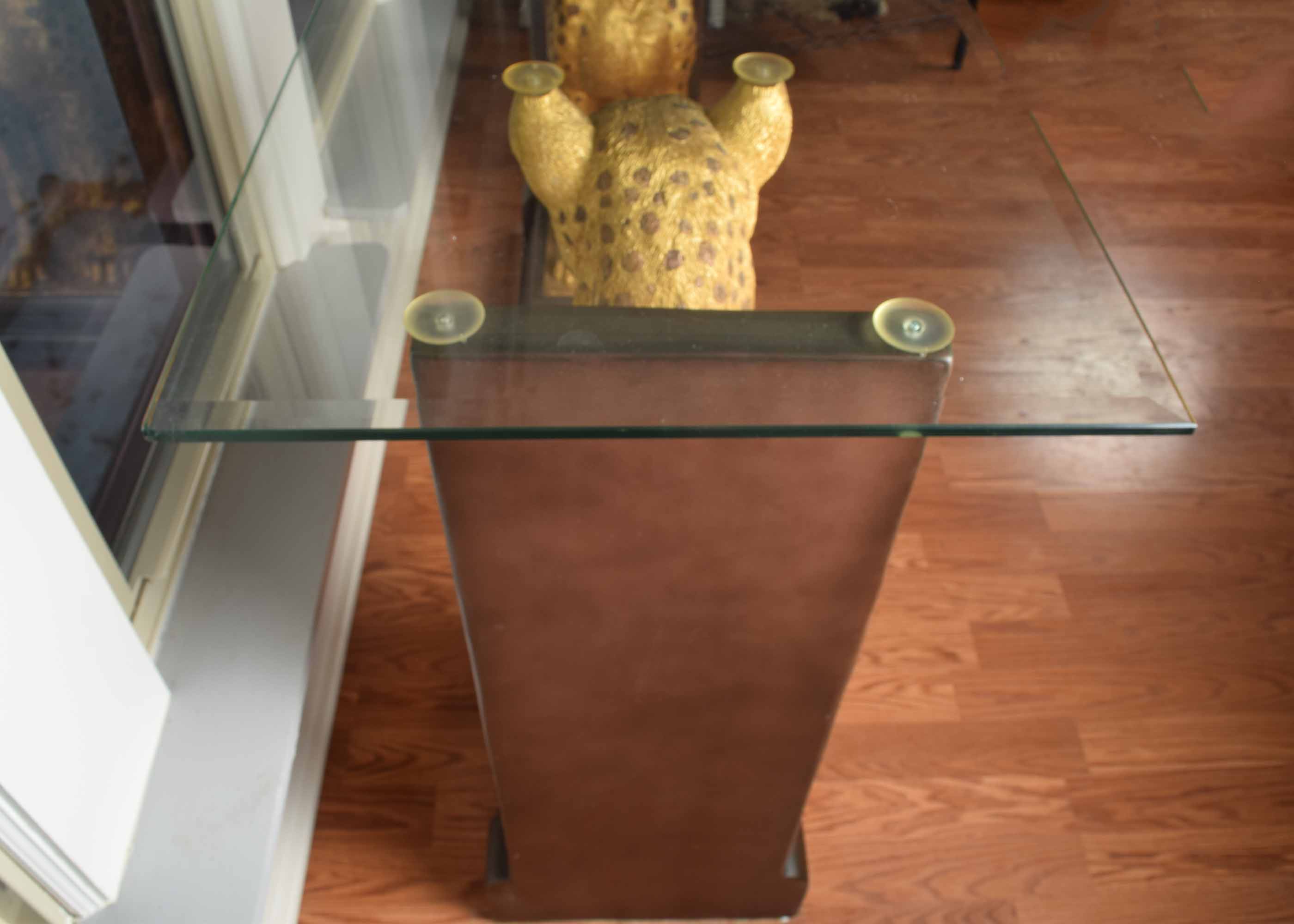 Glass Top Cheetah Base Console Table