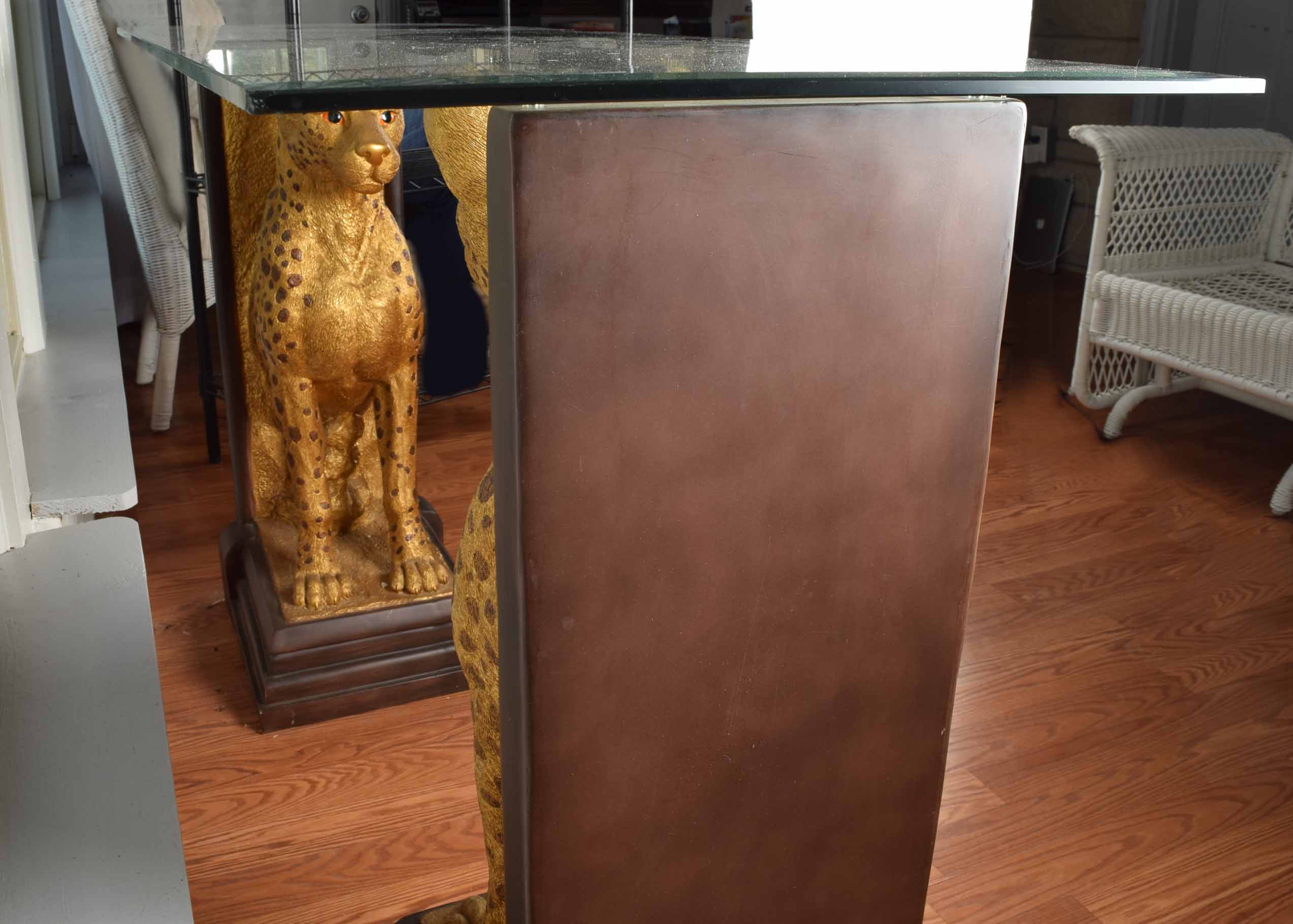 Glass Top Cheetah Base Console Table
